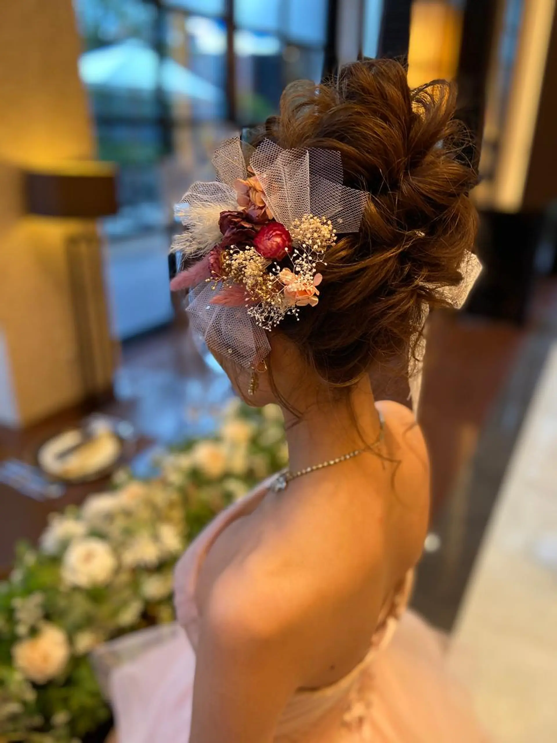 ロング ヘアアレンジ お団子ヘア ヘアアンドメイクムタ 新居のヘアスタイル