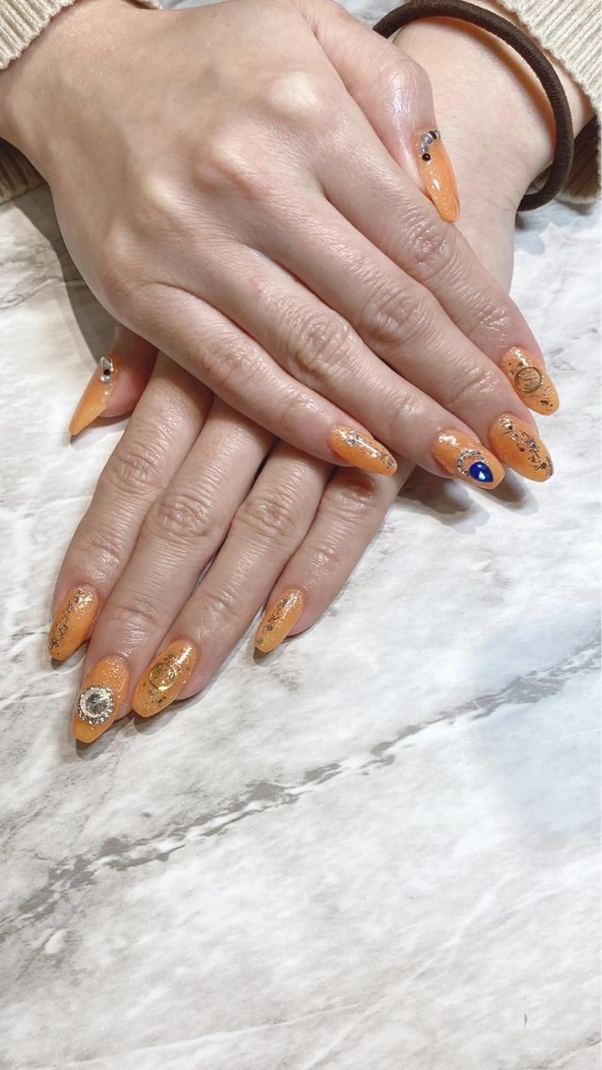 ネイル オレンジ ハンドネイル フットネイル ハンドケア nail salon  AlgeTy所属・✴︎:.｡. MAKI.｡.:✴︎のネイルデザイン