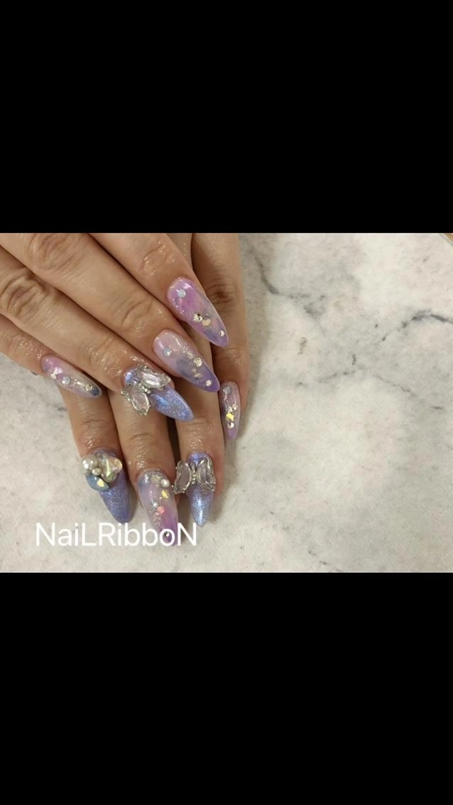 ネイル ネイルリボン 受付スタッフのネイルデザイン