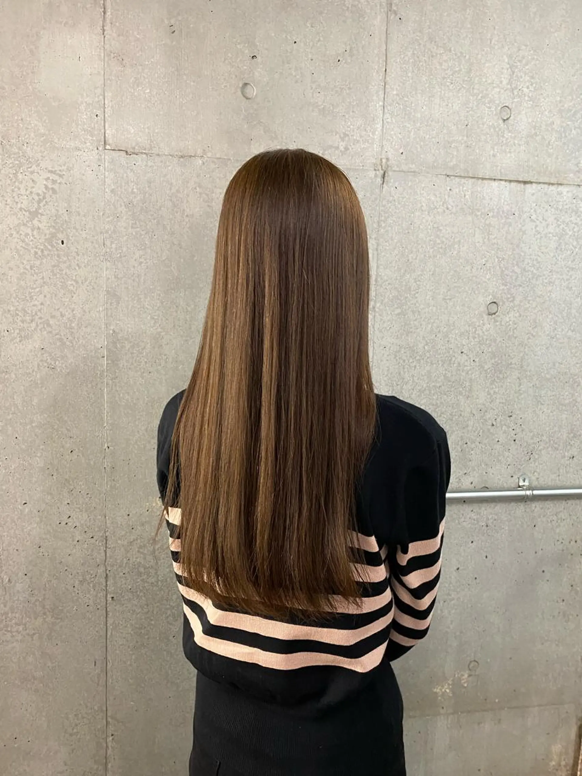 ロング センターパート/ニ ュアンスパーマのヘアスタイル