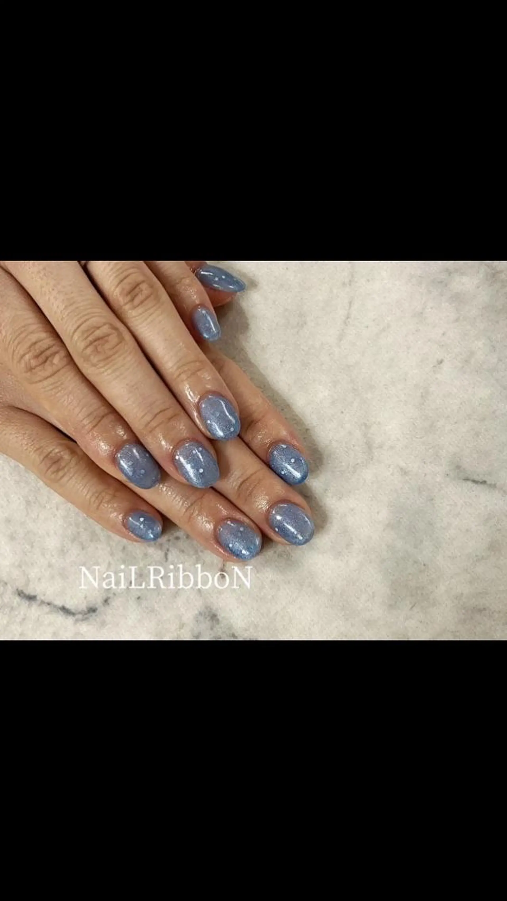 ネイル ネイルリボン 受付スタッフのネイルデザイン