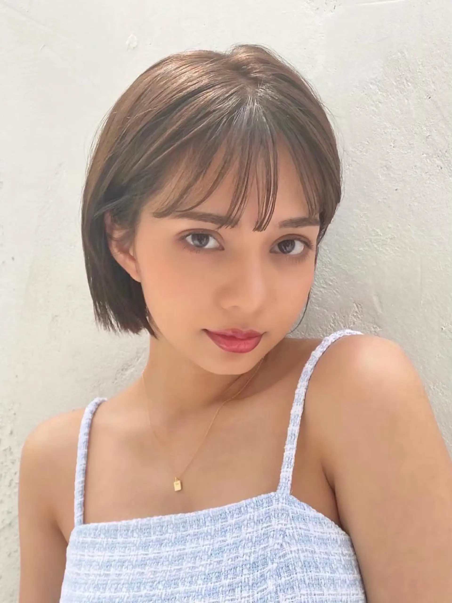 ショート レイヤーカット /透明感カラー西田のヘアスタイル