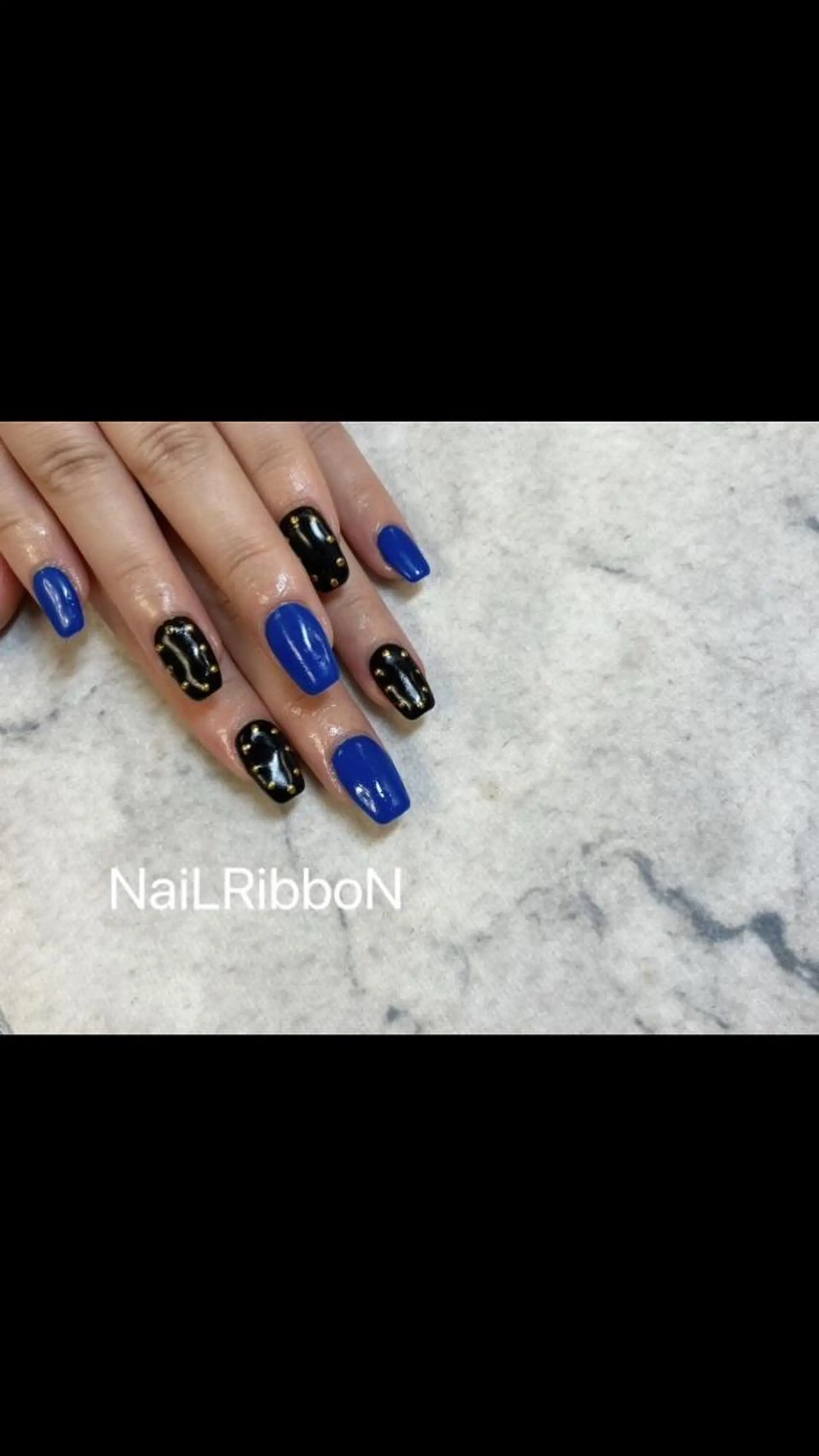 ネイル ネイルリボン 受付スタッフのネイルデザイン