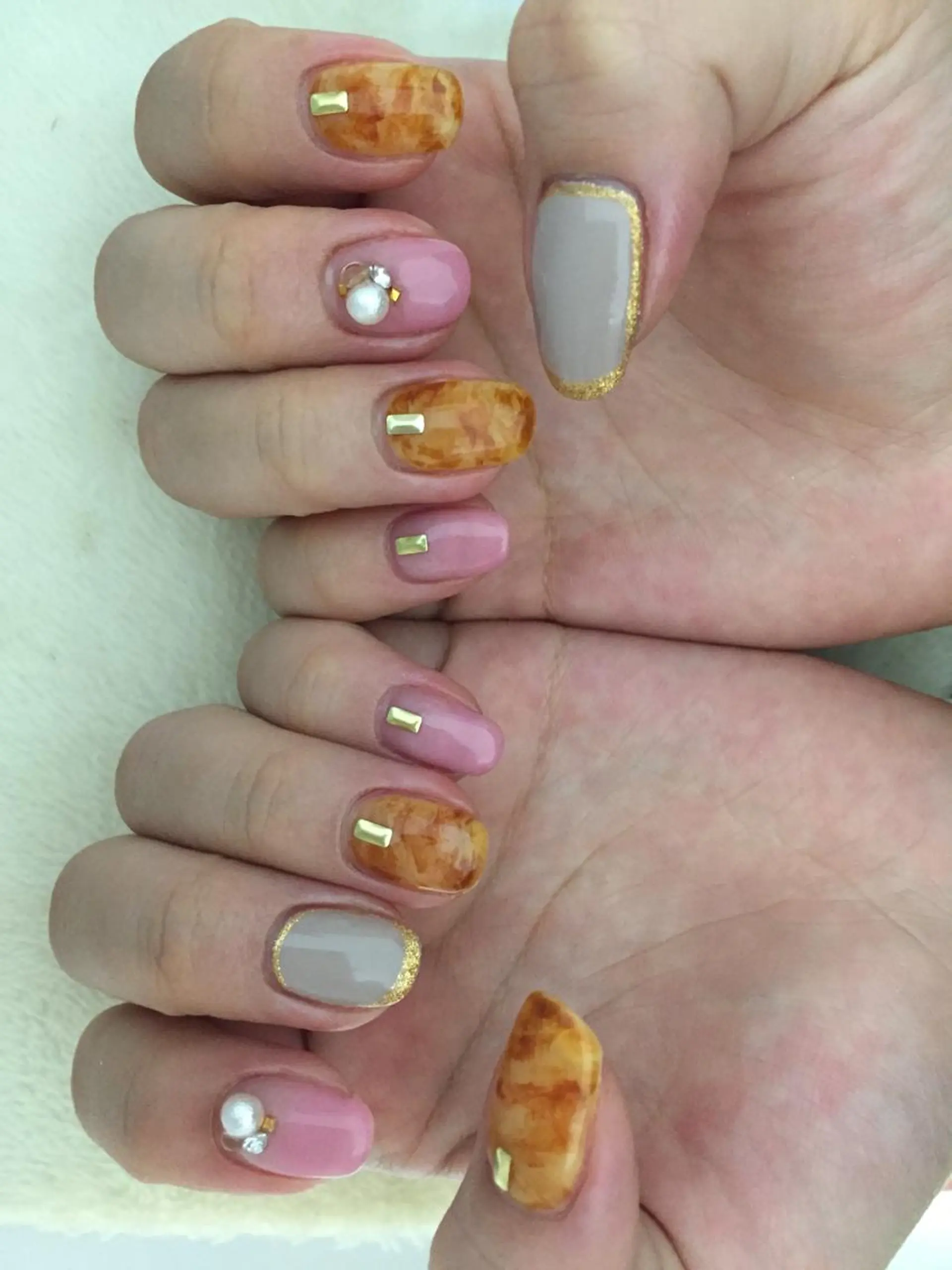 ネイル べっ甲ネイル Sympa 𝓜iwako🐰ᩚのネイルデザイン