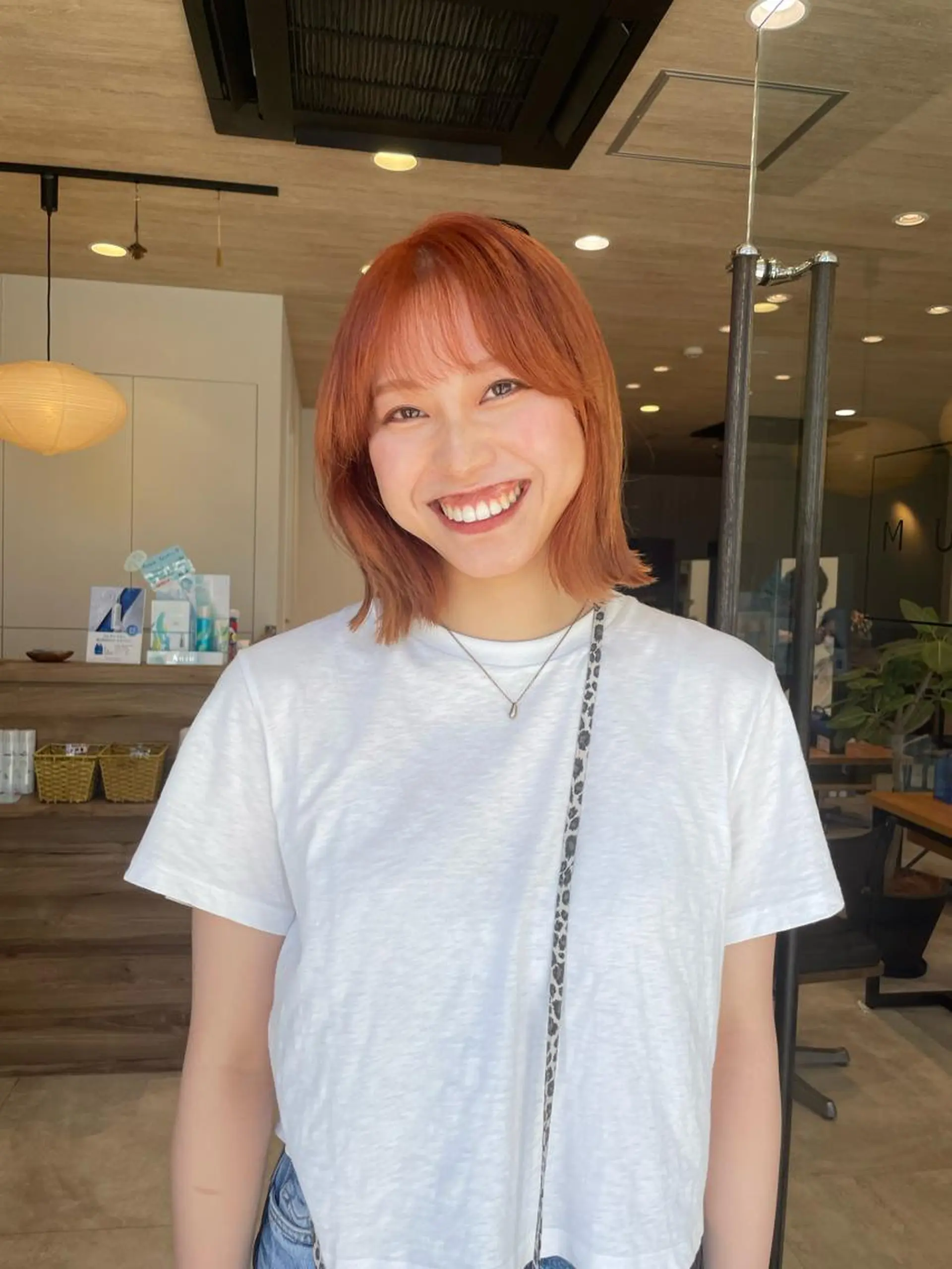 ショート カラー ブリーチ オレンジ ヘアカラー トリートメント ヘッドスパ パーマ指名No1 /namiのヘアスタイル