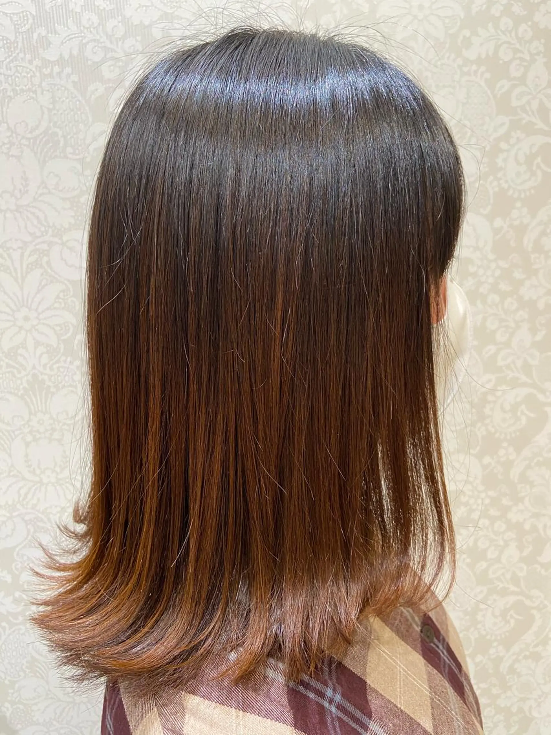 ミディアム 伸ばしかけ 外ハネヘア 日置美容室所属・石井 佑飛のヘアスタイル