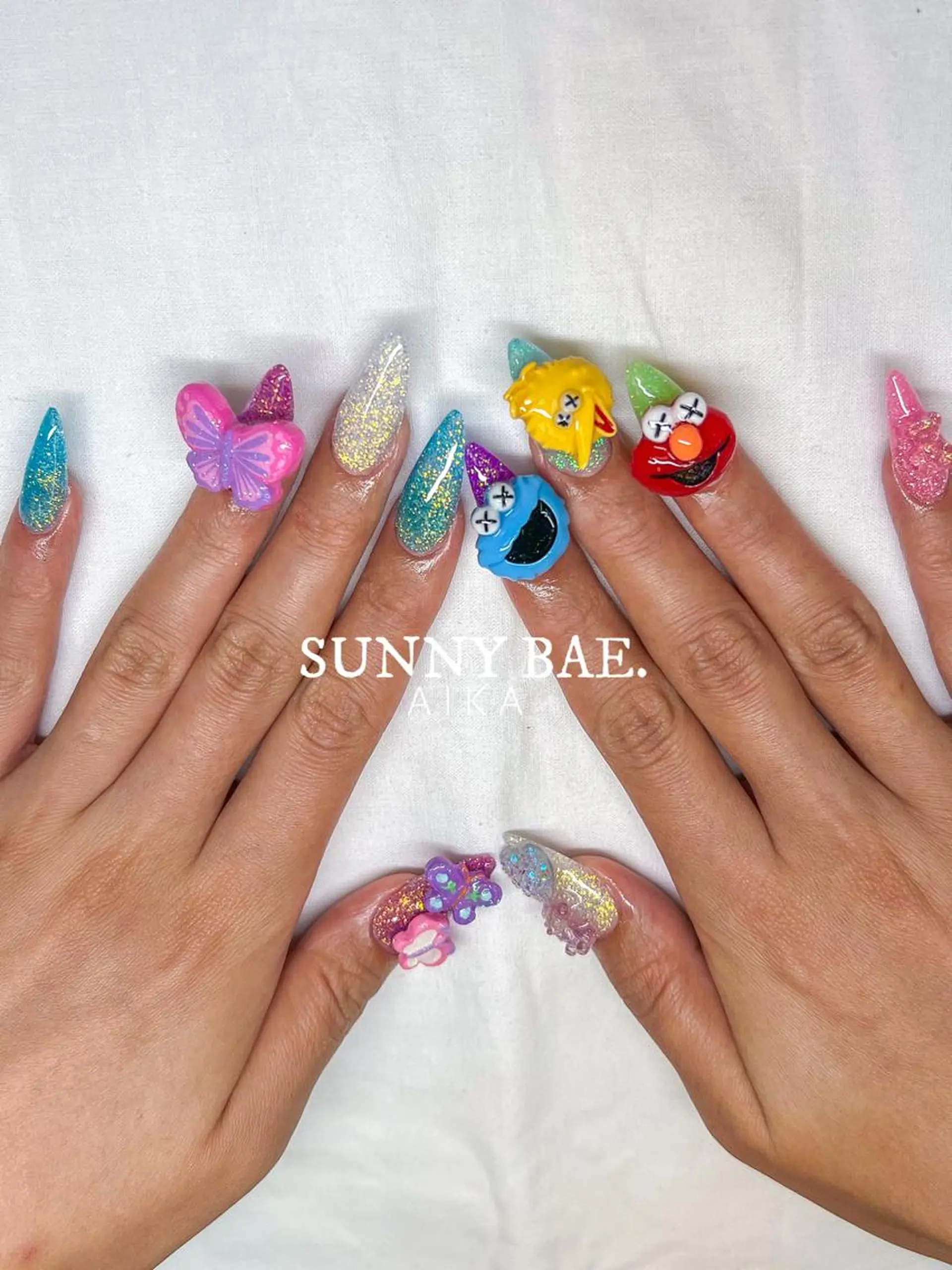 セミロング ネイル アートネイル ジェルネイル キラキラネイル ロングネイル 持ち込み SUNNY BAE.所属・Made By AIKAのネイルデザイン