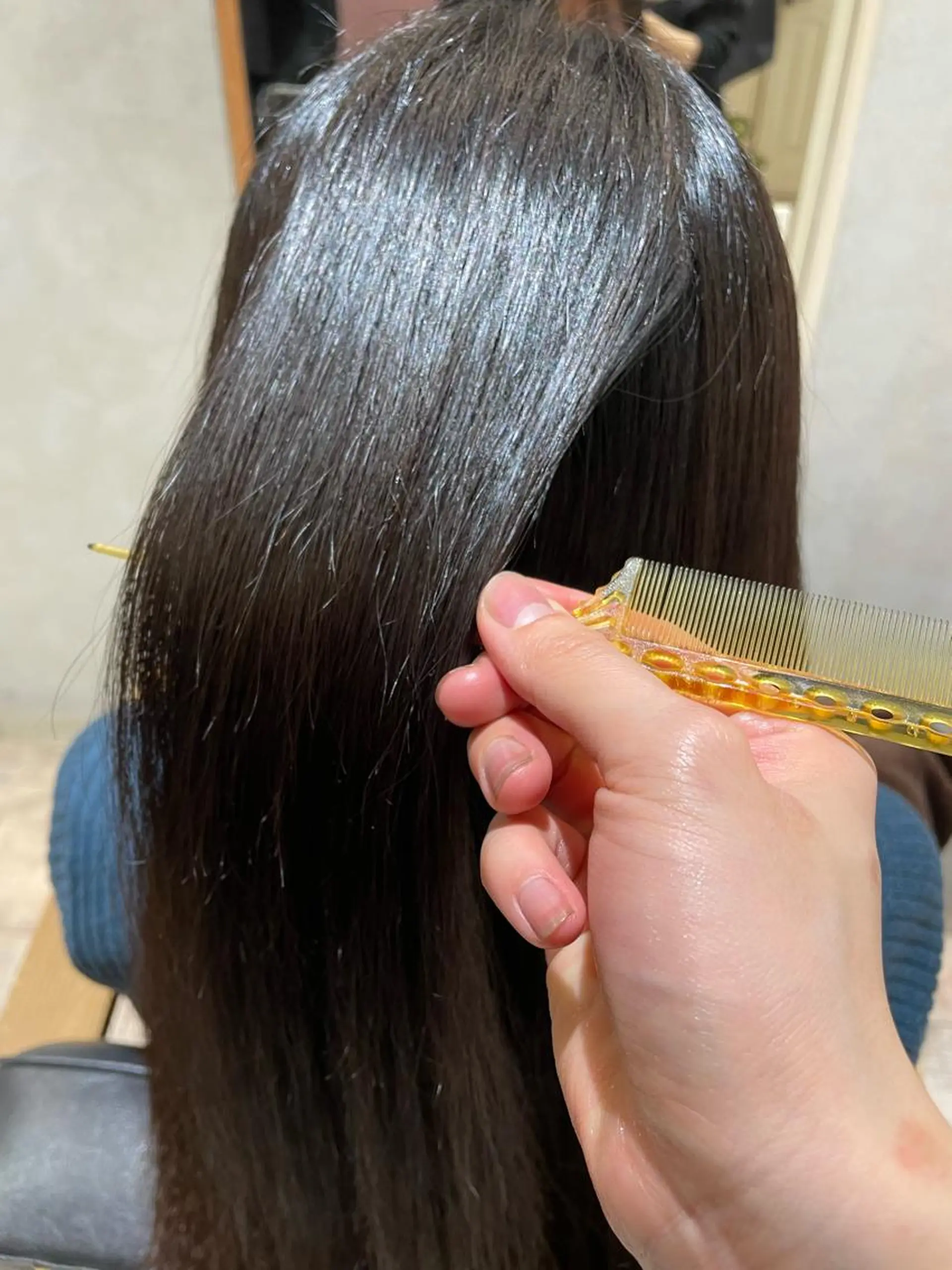 ロング ulQua 戸田のヘアスタイル