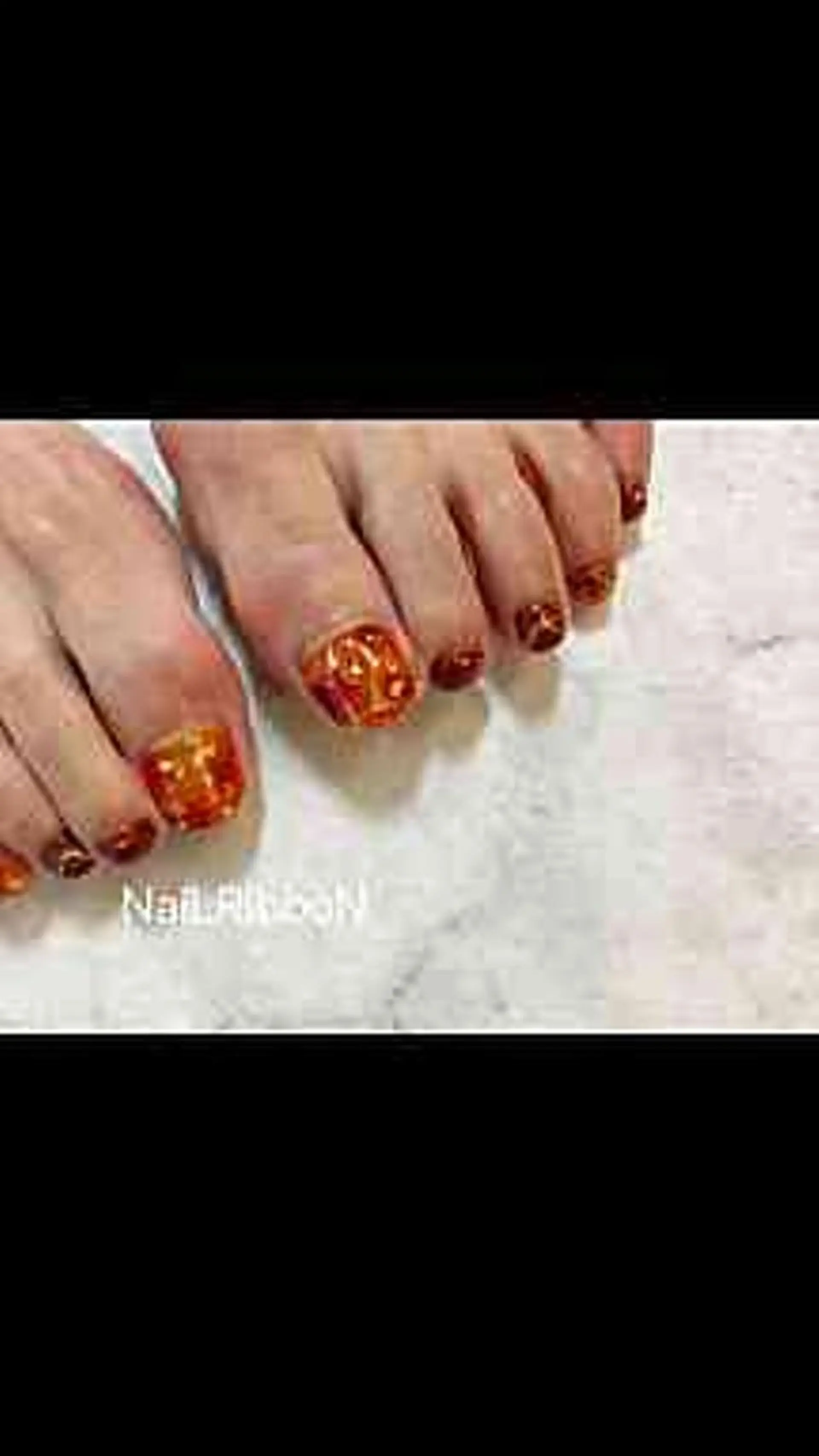 ネイル ネイルリボン 受付スタッフのネイルデザイン