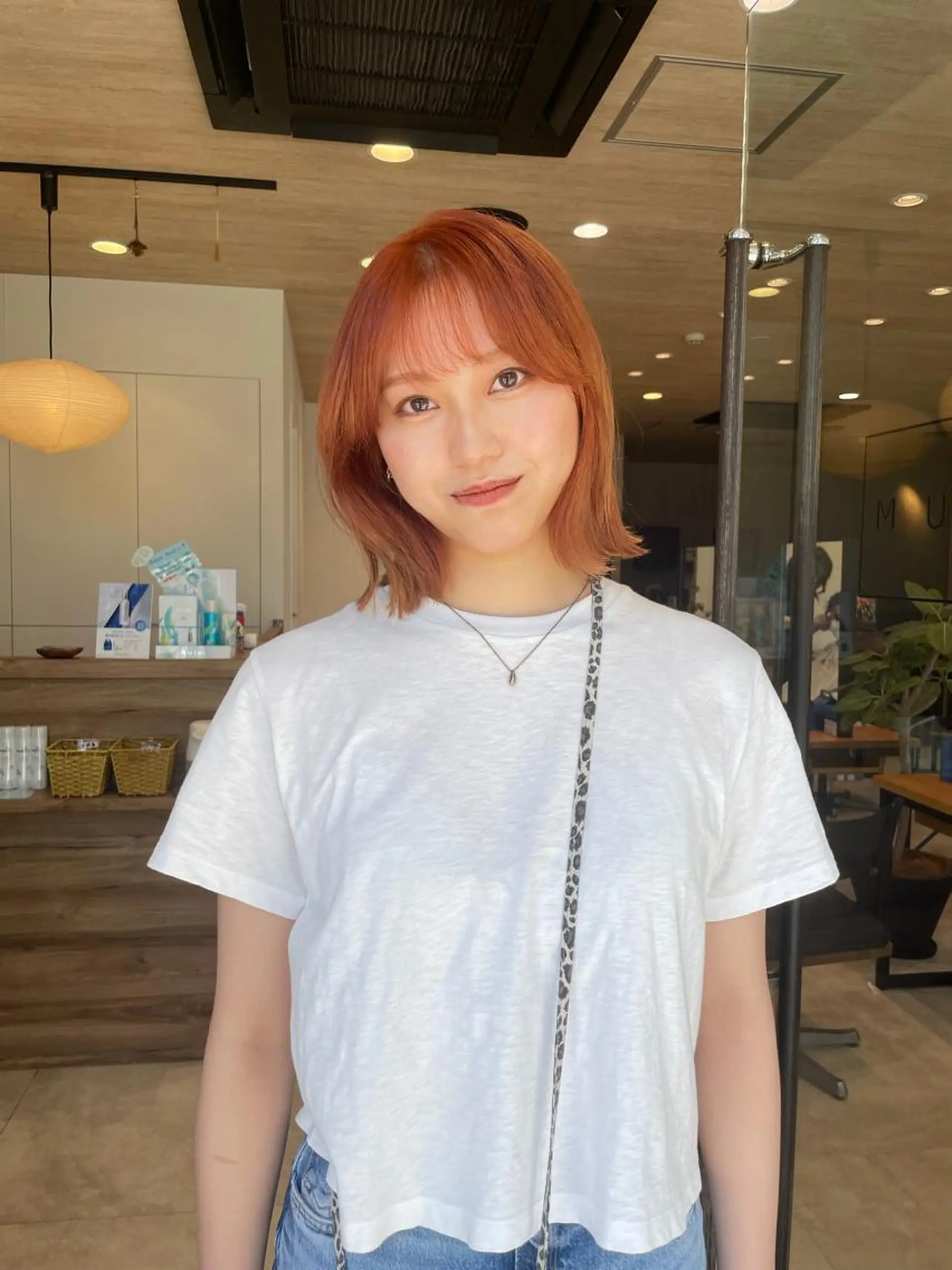ショート カラー ブリーチ オレンジ ヘアカラー トリートメント ヘッドスパ パーマ指名No1 /namiのヘアスタイル
