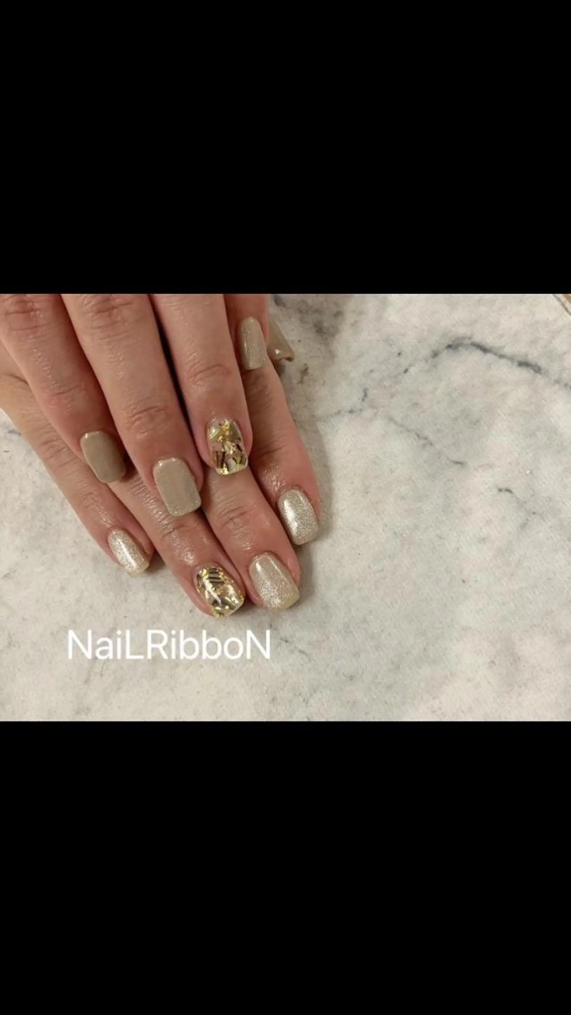 ネイル ネイルリボン 受付スタッフのネイルデザイン