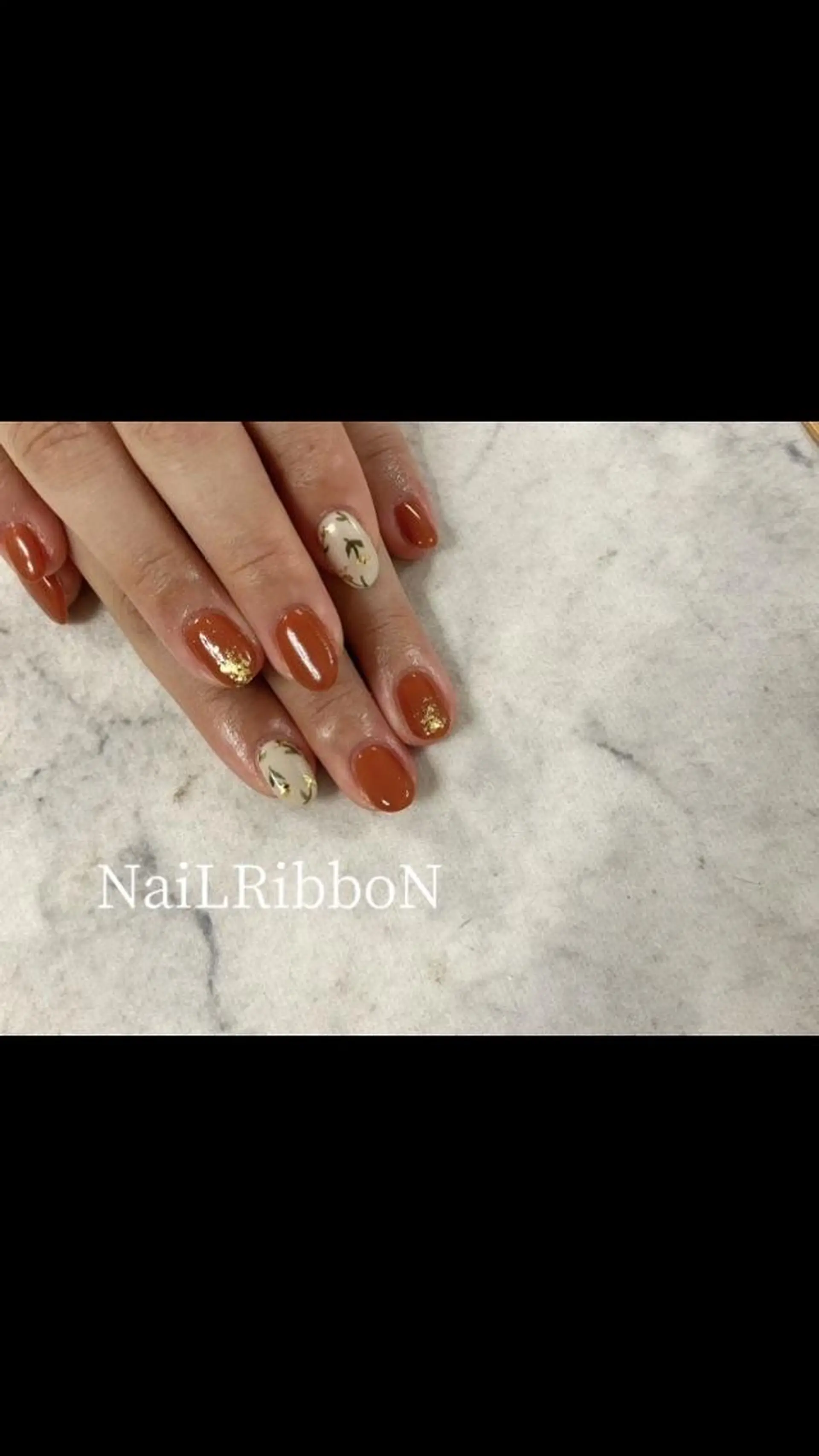 ネイル ネイルリボン 受付スタッフのネイルデザイン