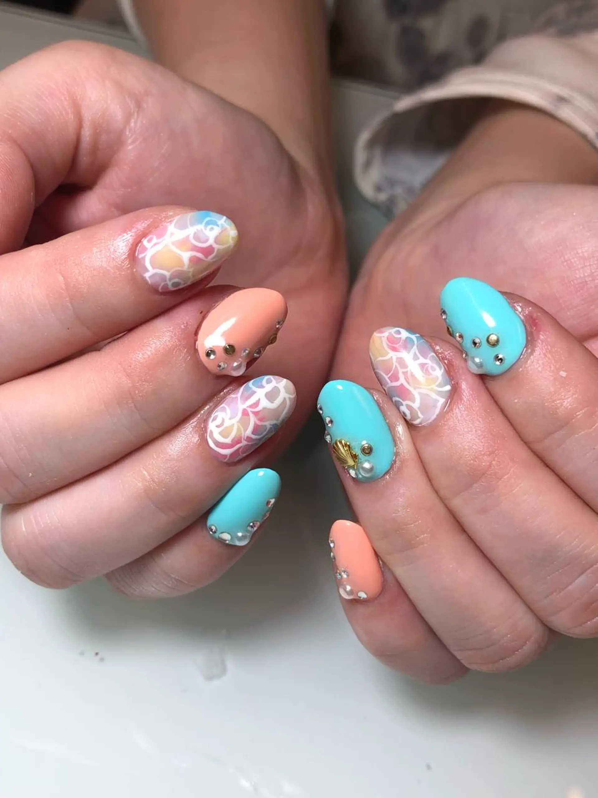 ネイル アートネイル ブルー フラワーネイル オレンジ パステルネイル M nail はやまうららのネイルデザイン