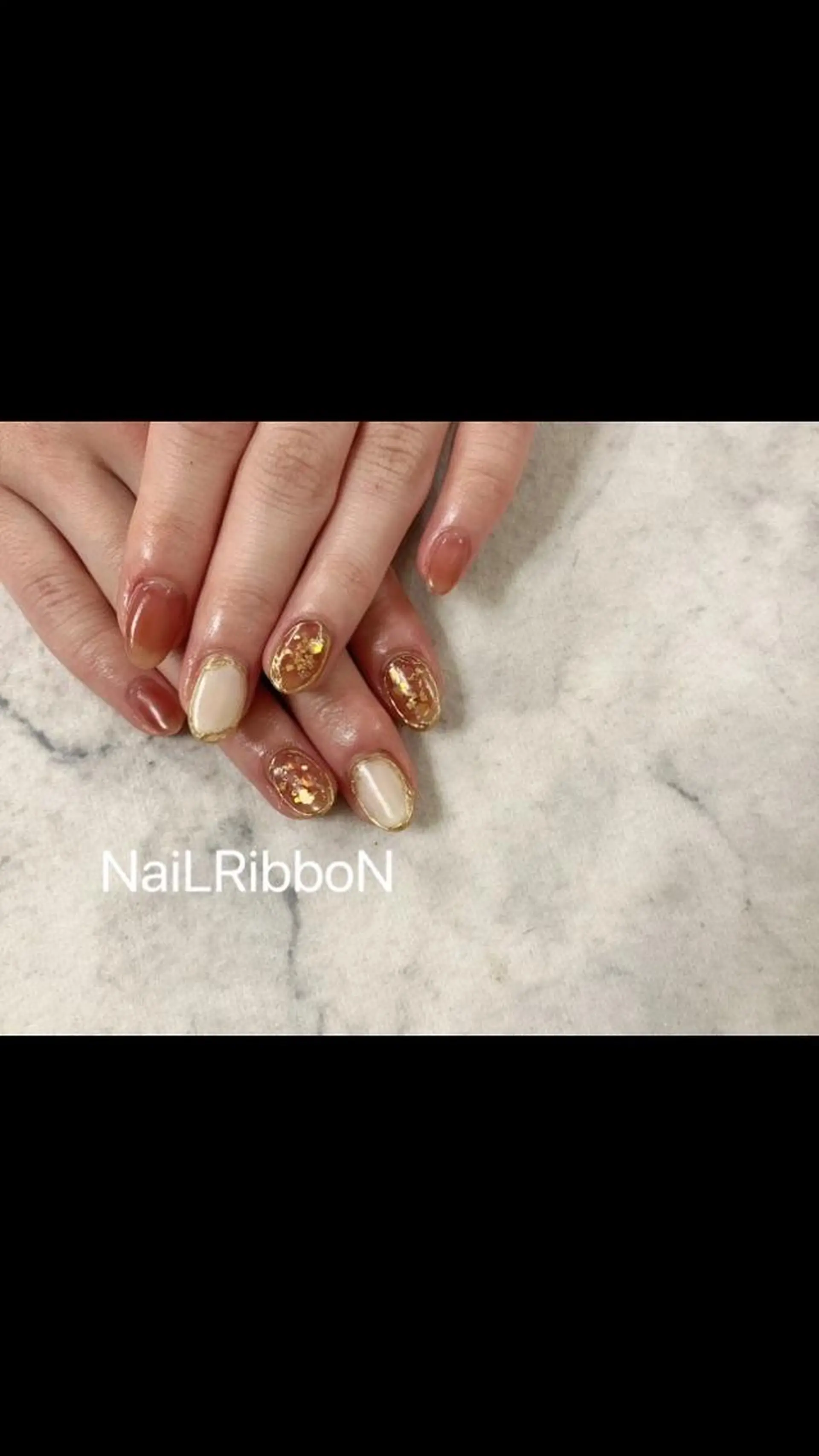 ネイル ネイルリボン 受付スタッフのネイルデザイン