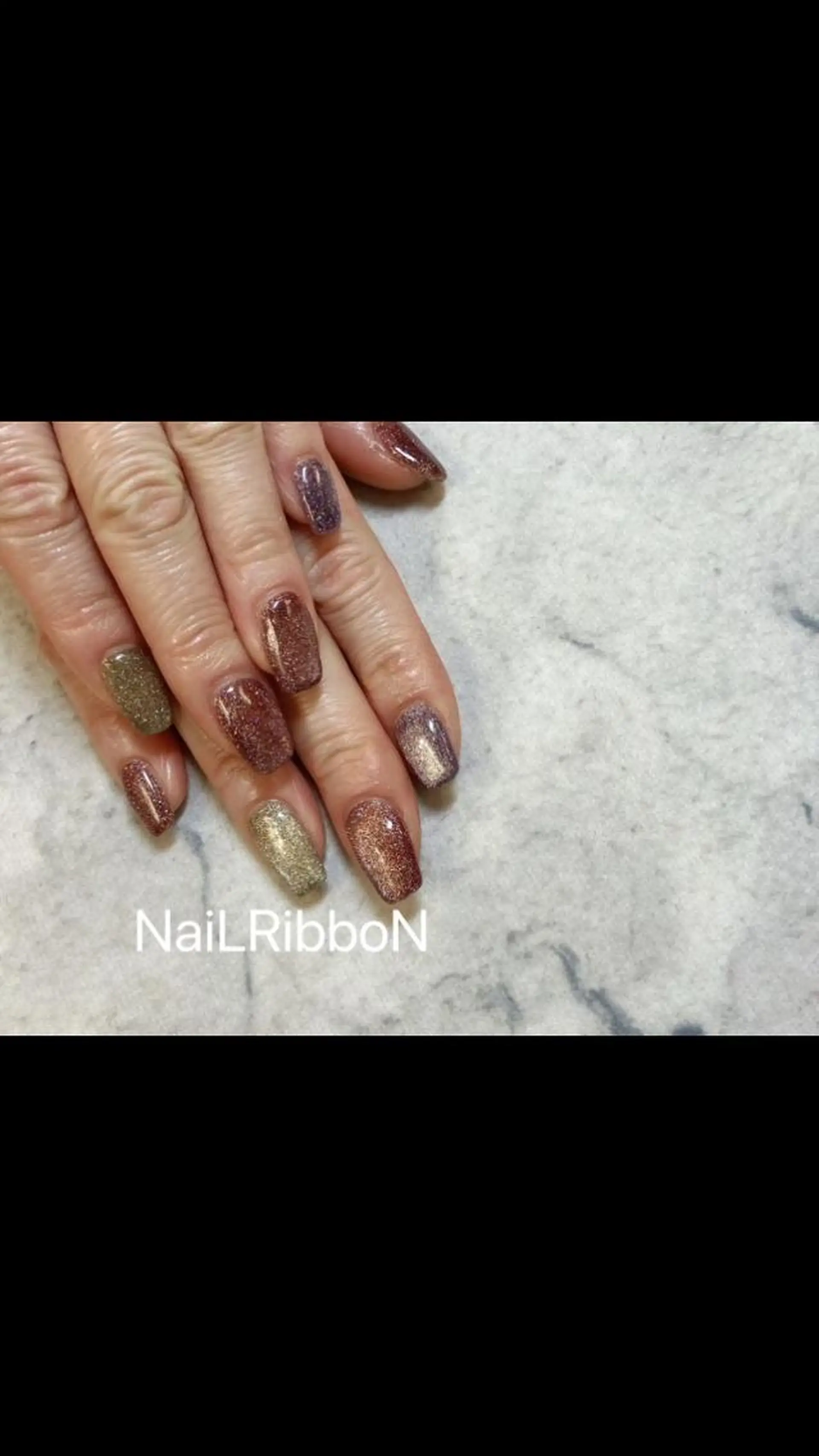 ネイル ネイルリボン 受付スタッフのネイルデザイン