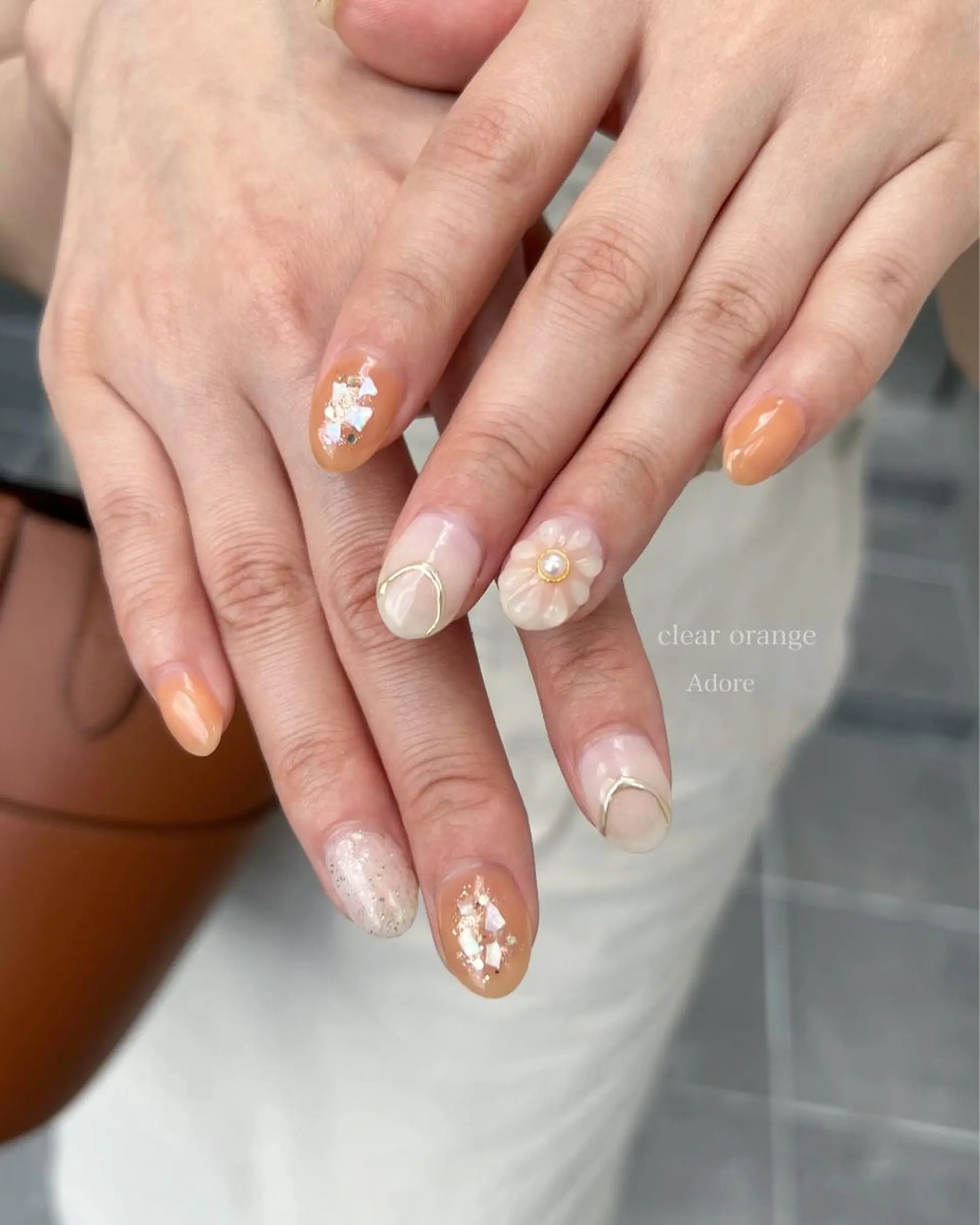 ネイル フットネイル ジェルネイル ニュアンスネイル ワンカラーネイル オレンジ ハンドネイル Nail Adore.のネイルデザイン