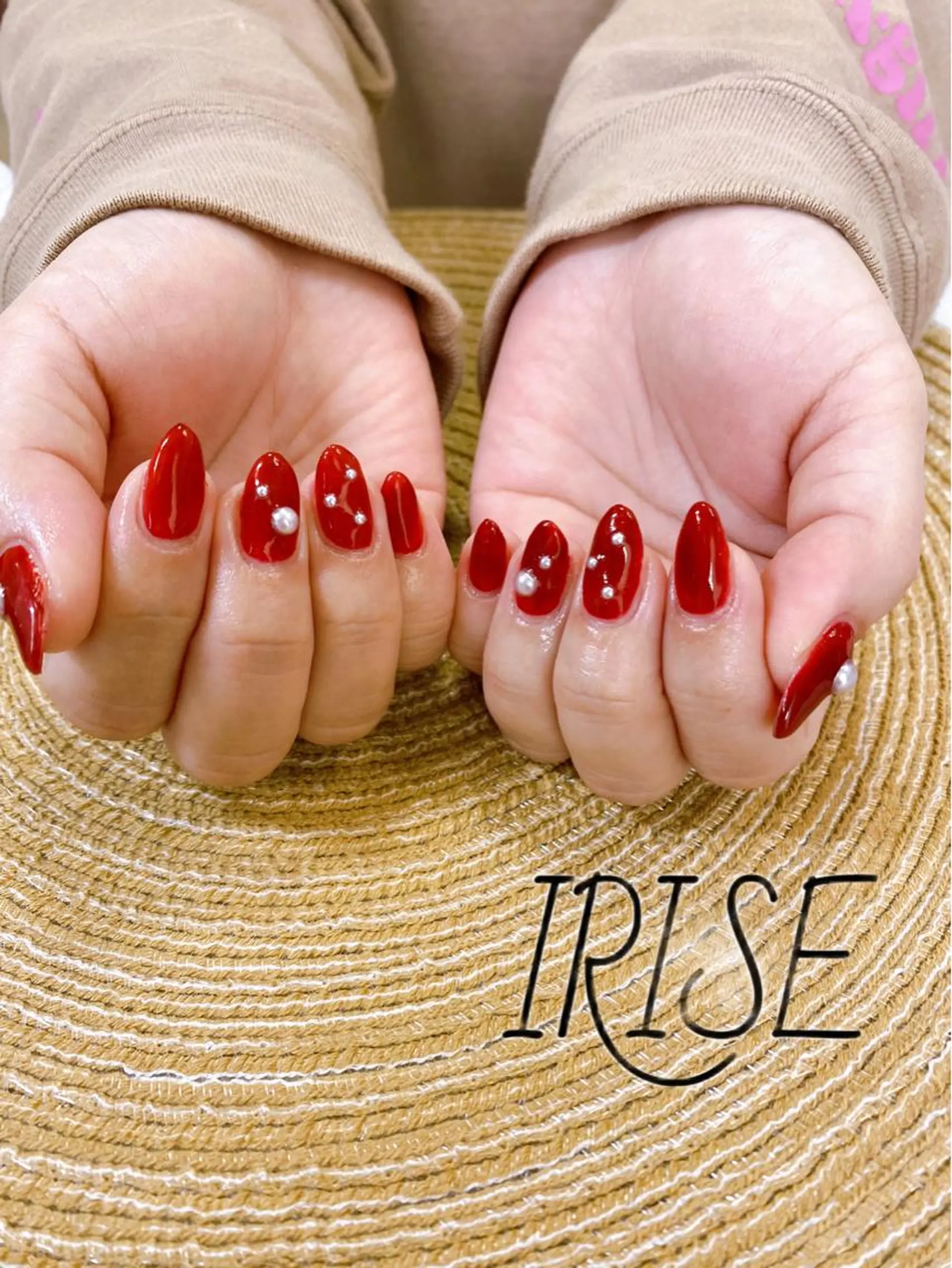 ネイル 赤色 シンプルネイル salon de   irise所属・salon de iriseのマツエク・マツパデザイン
