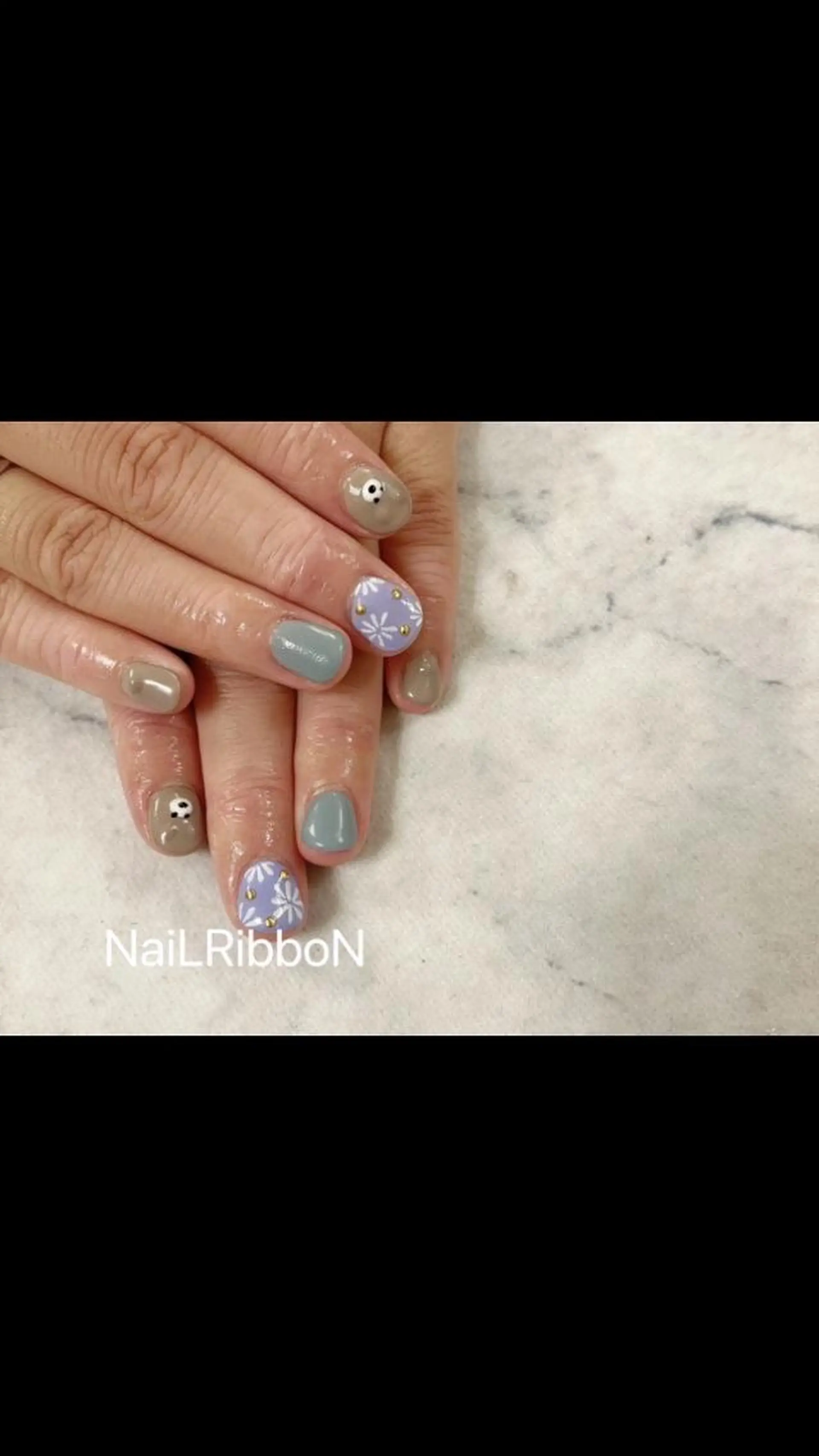 ネイル ネイルリボン 受付スタッフのネイルデザイン