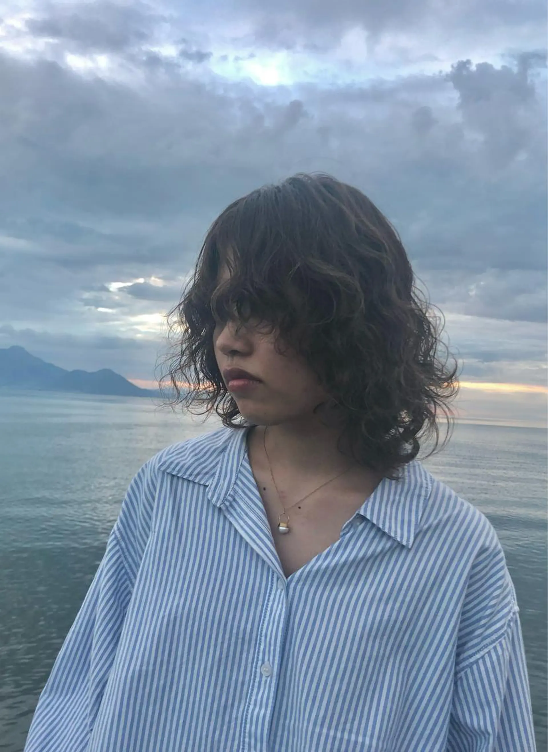 ミディアム パーマ ミディアムレイヤー レイヤーカット SALOWIN熊本 yuseiのヘアスタイル