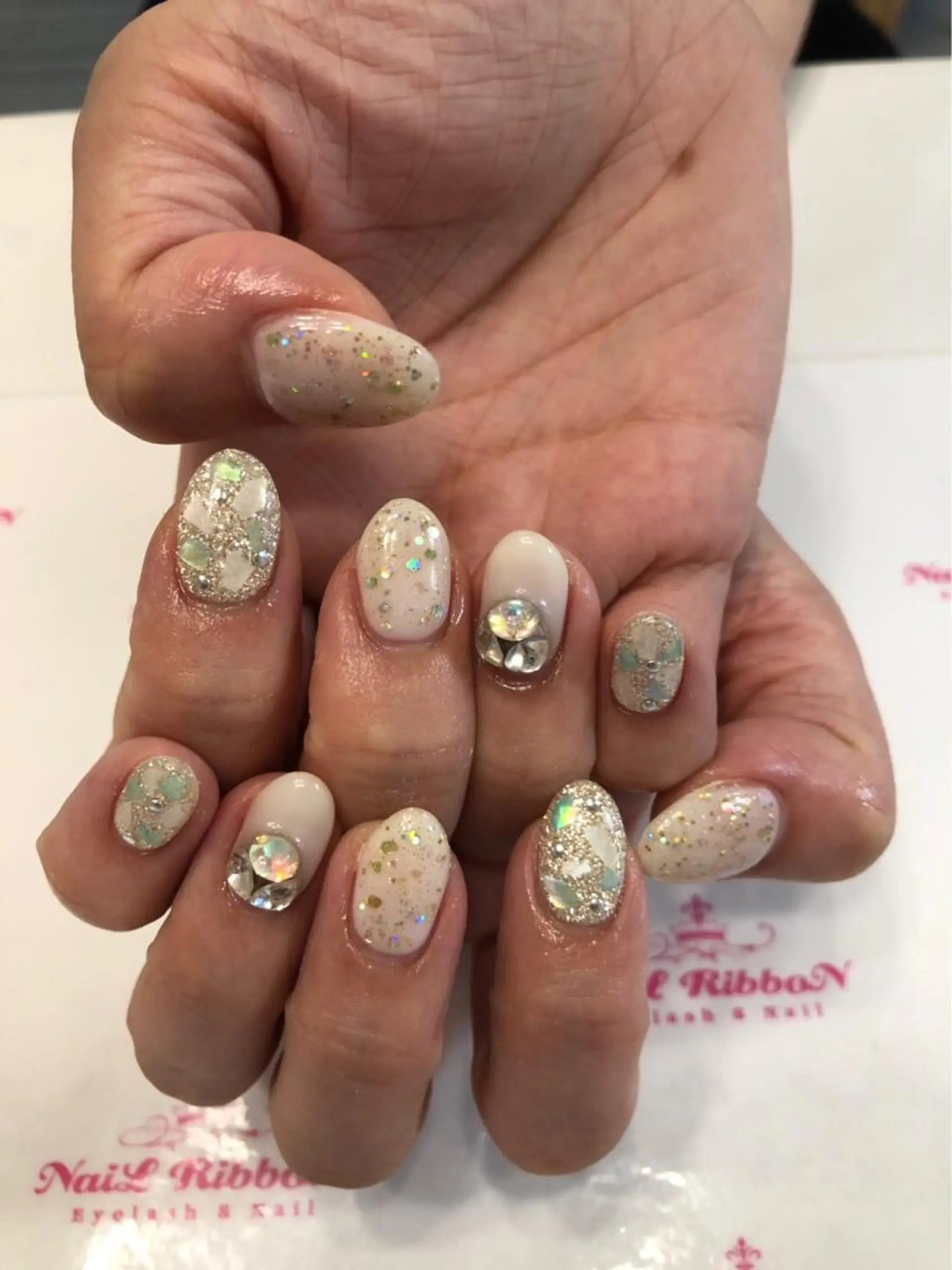 ネイル 春ネイル ネイルリボン 受付スタッフのネイルデザイン