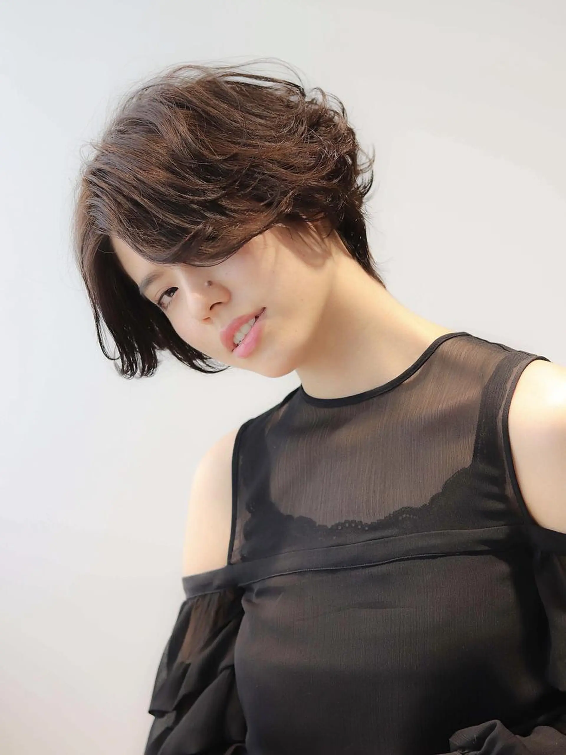 ショート パーマ 前下がりボブ ボブ くせ毛 斜めバング 外国人風カラー 髪質改善🌈縮毛矯正 荻原　達矢のヘアスタイル