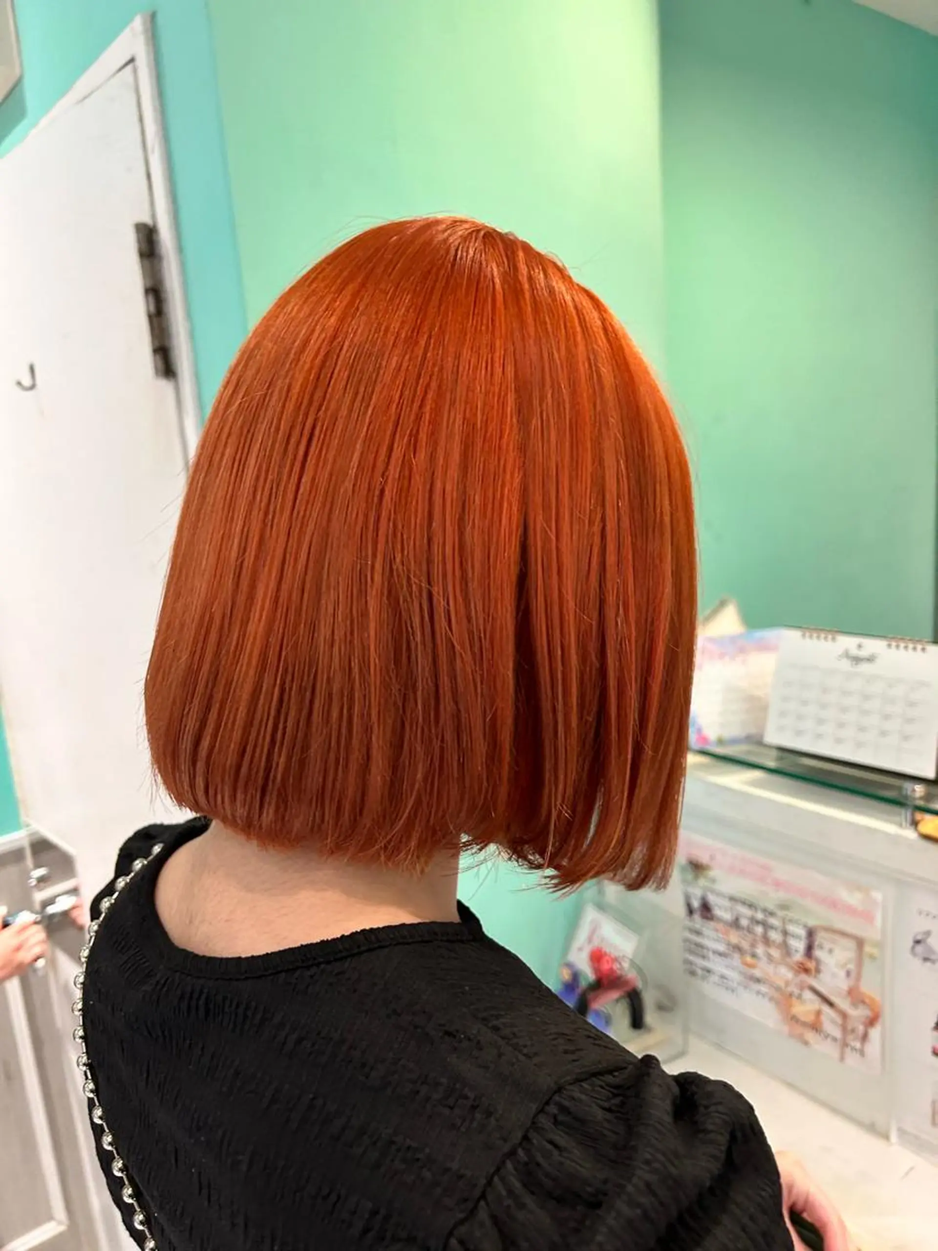 ミディアム カラー オレンジ イシイ シオリのヘアスタイル