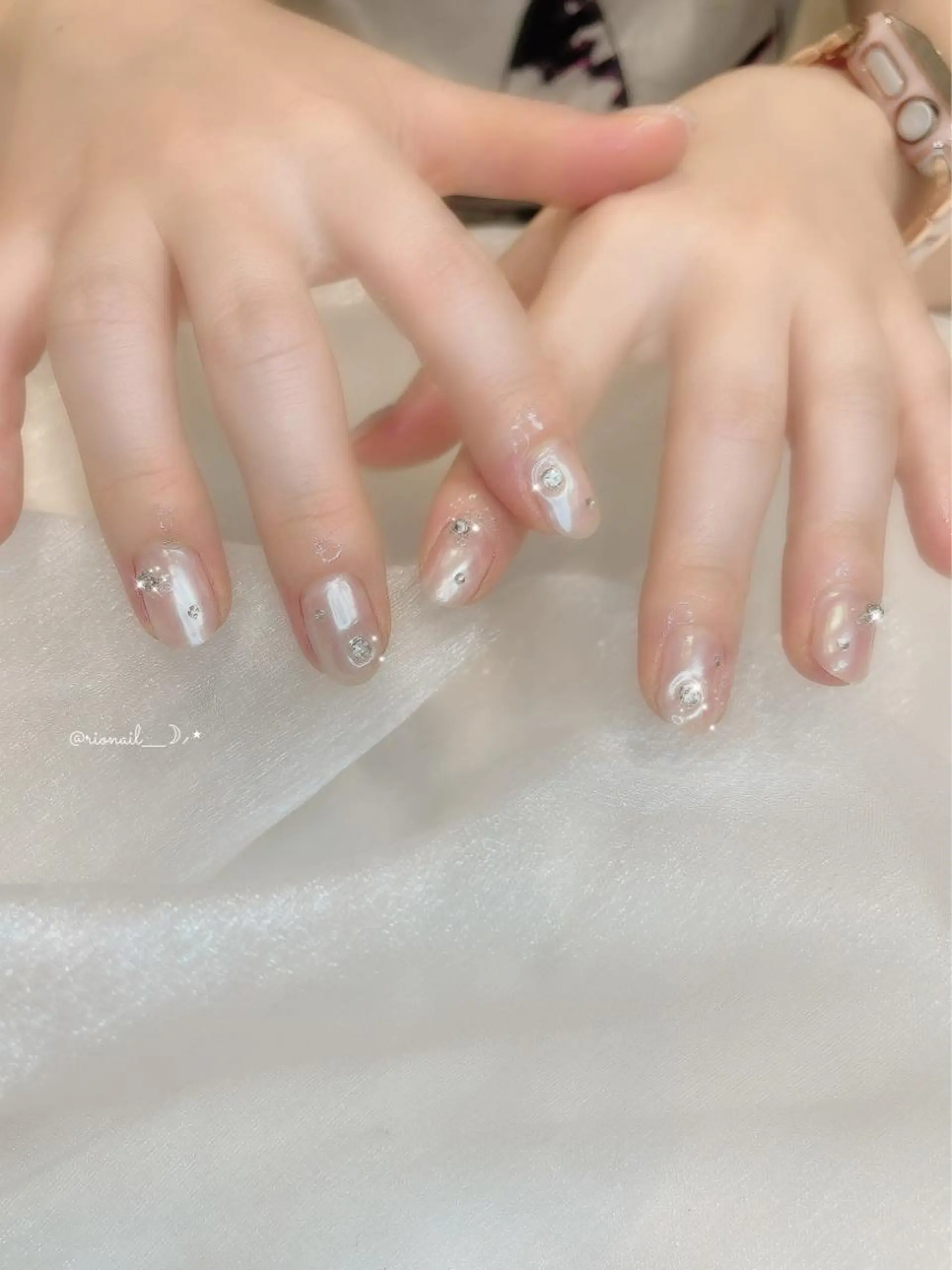 ネイル 𝘙𝘪𝘰𝘯𝘢 ...🕯🤍のネイルデザイン