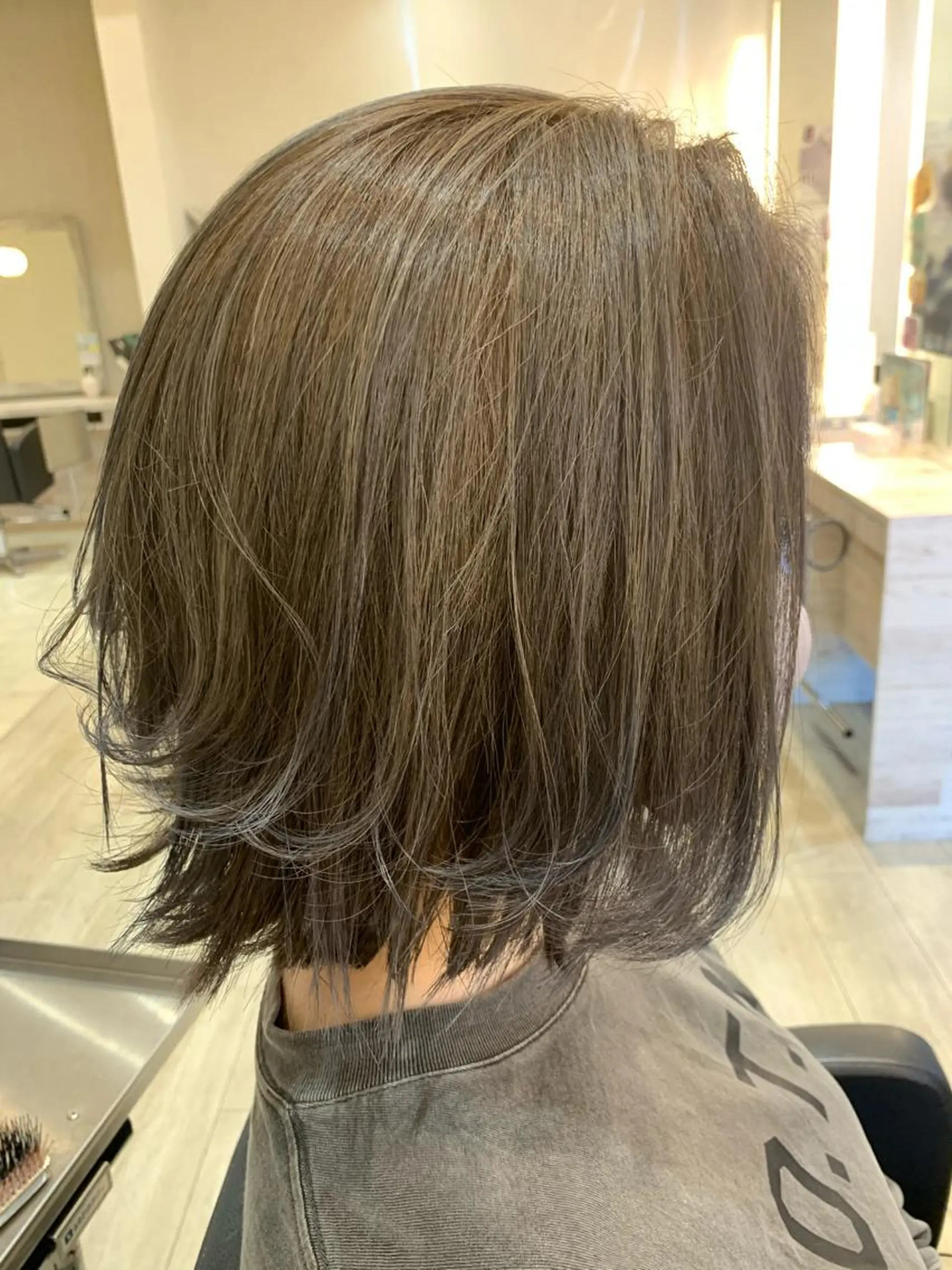 ショート レイヤー／パーマ 西山賢志のヘアスタイル