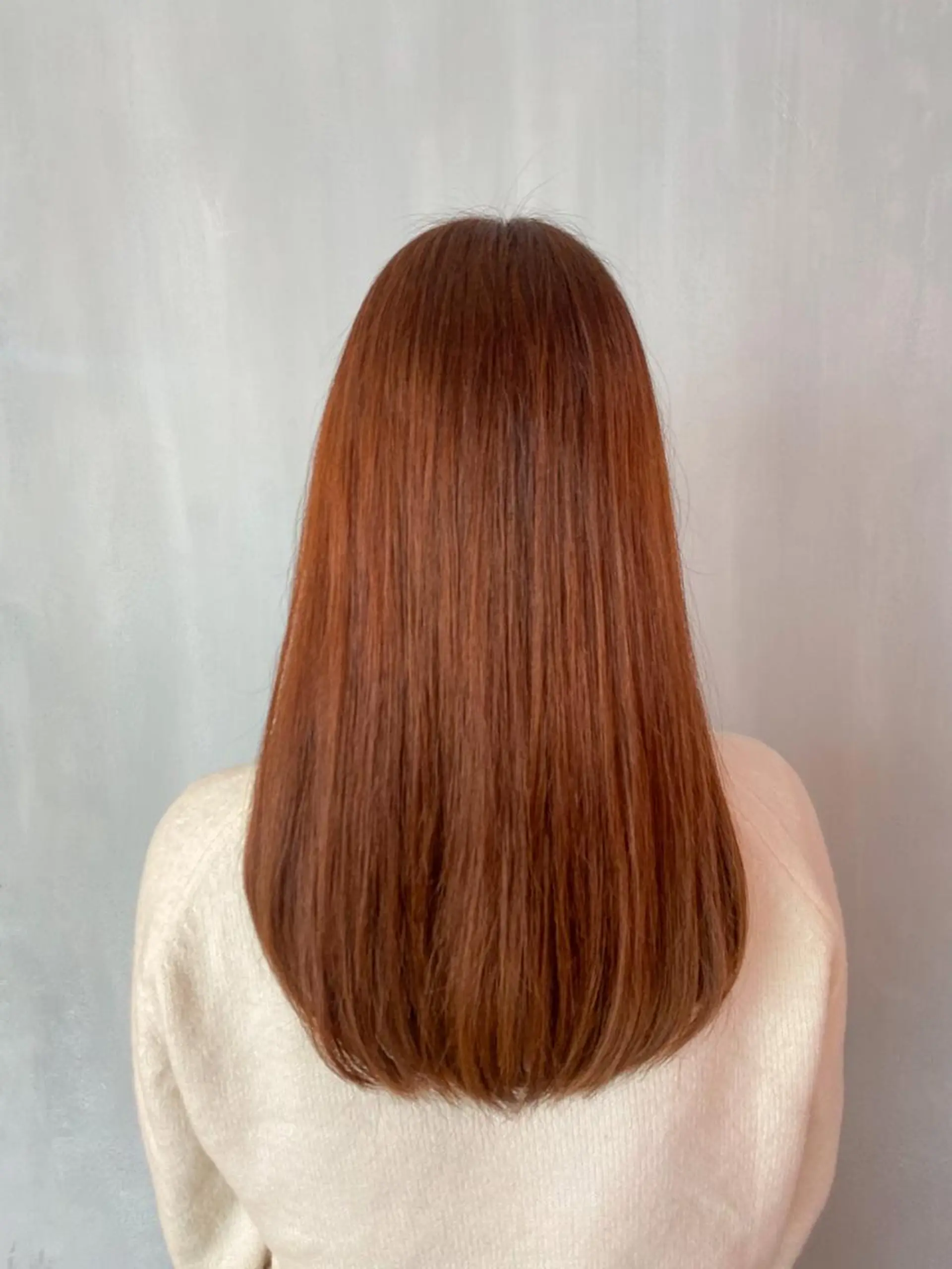 ロング カラー オレンジ 韓国風ヘア ヘアカラー トリートメント オーストヘアージジ所属・TAI透明カラー 柔らかい縮毛矯正のヘアスタイル