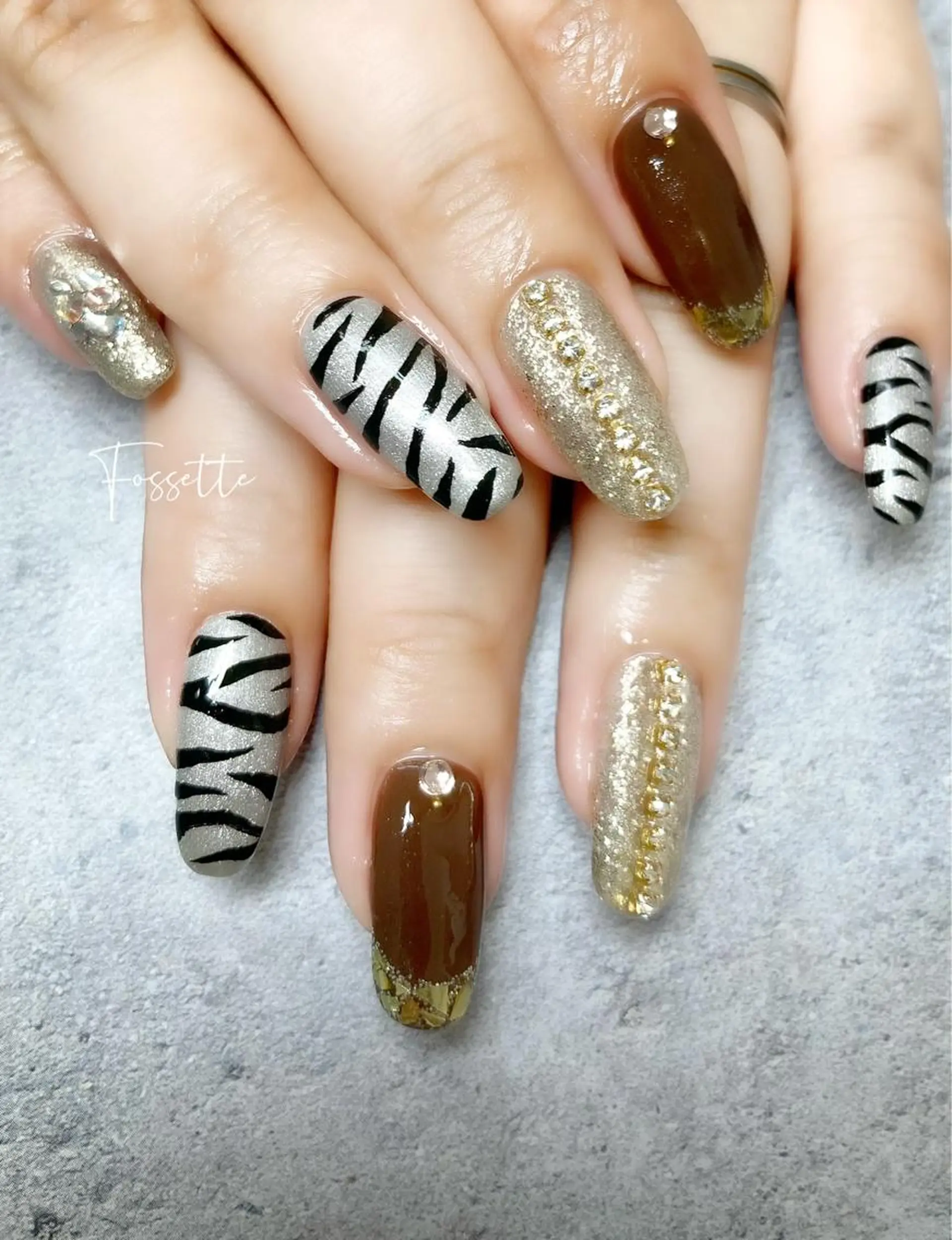 ネイル アニマル柄 フレンチネイル ガラスフレンチ ラメ(グリッター) マグネットネイル nailsalon Fossetteのネイルデザイン