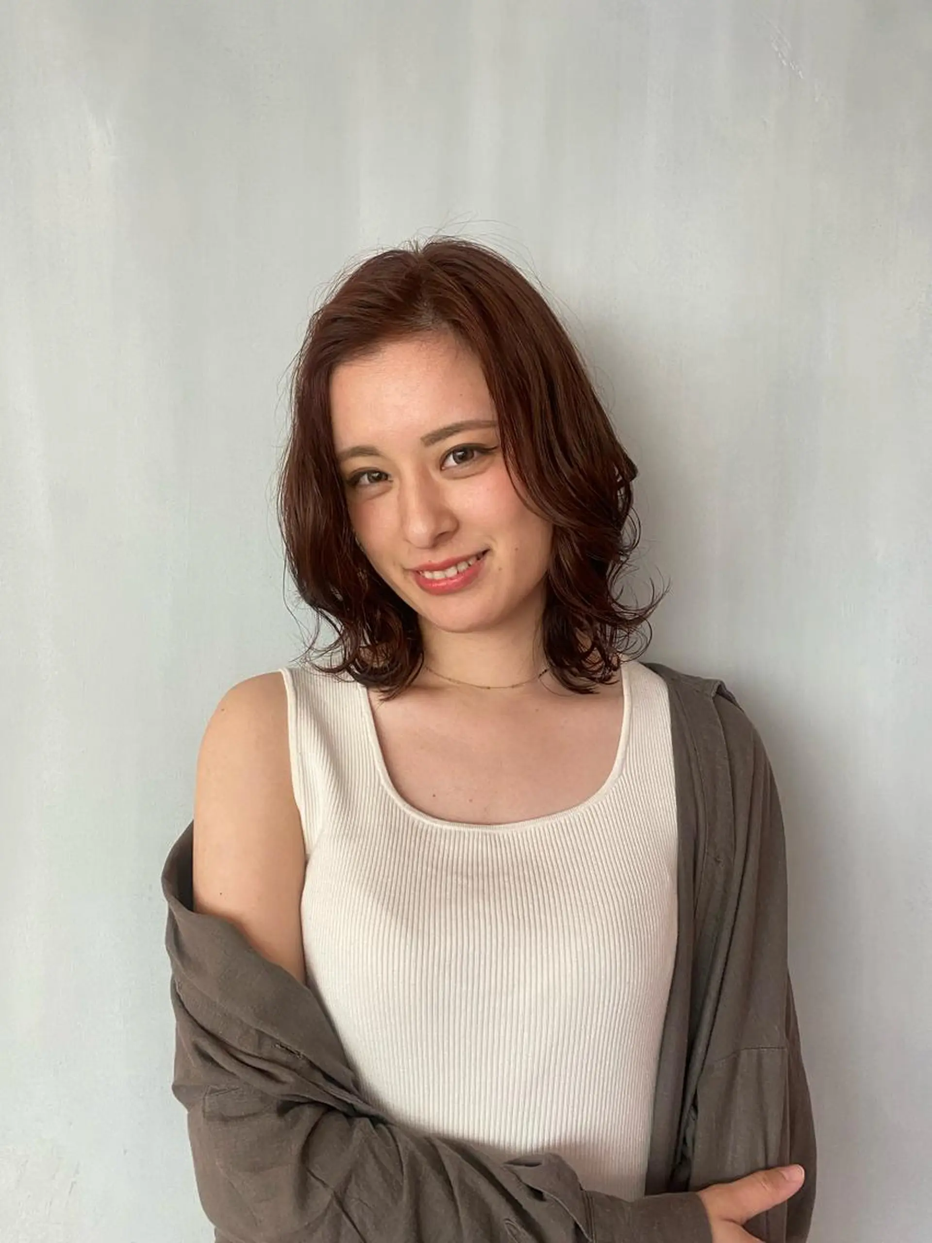 ミディアム カラー オレンジ ヨシンモリ カット ヘアカラー トリートメント オーストヘアージジ所属・TAI透明カラー 柔らかい縮毛矯正のヘアスタイル