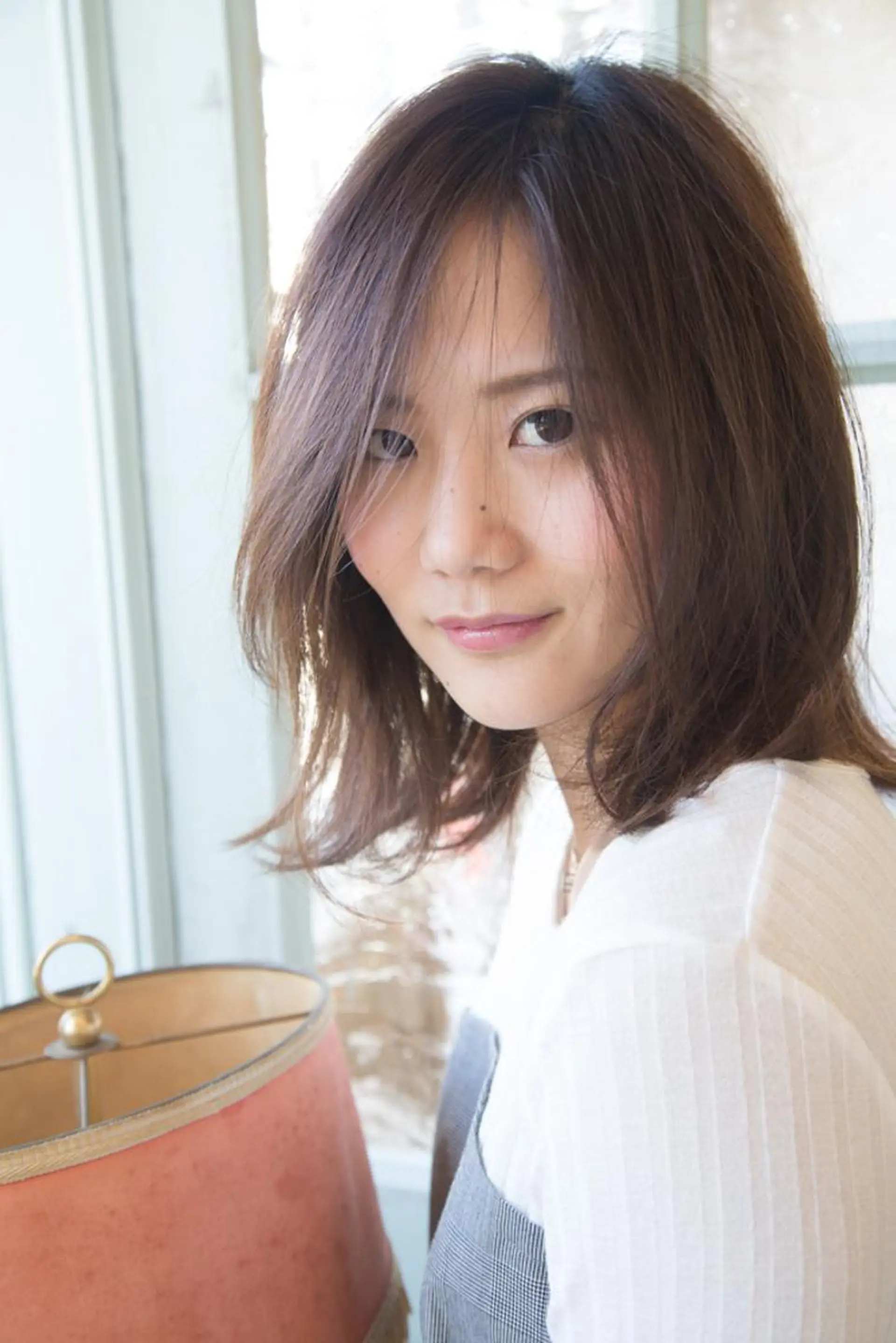 ミディアム 【デザイナー】田中 美生のヘアスタイル