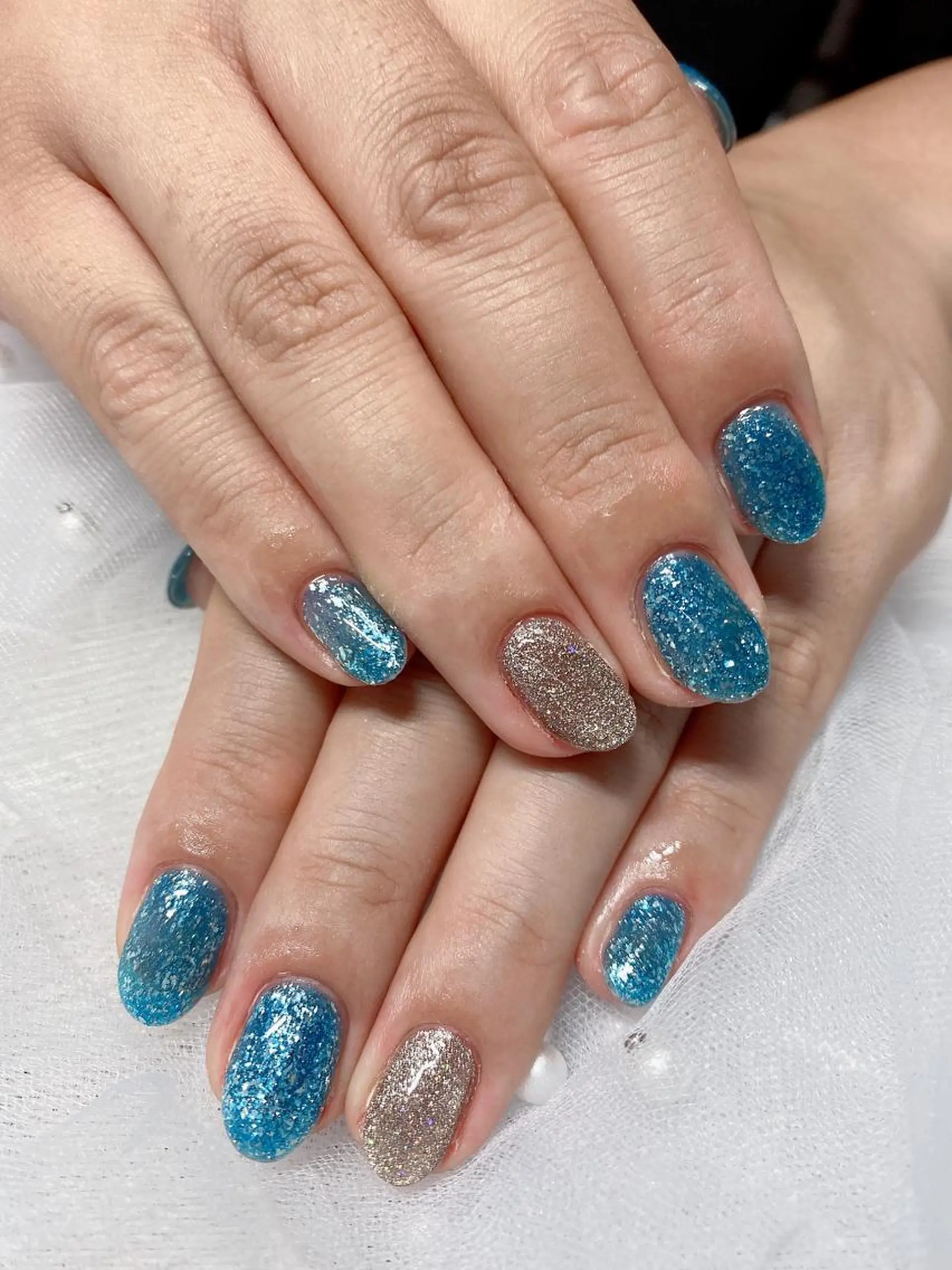 ネイル ブルー ラメ(グリッター) ワンカラーネイル Jasmine nailsalon所属・ジャスミン ネイルサロンのネイルデザイン