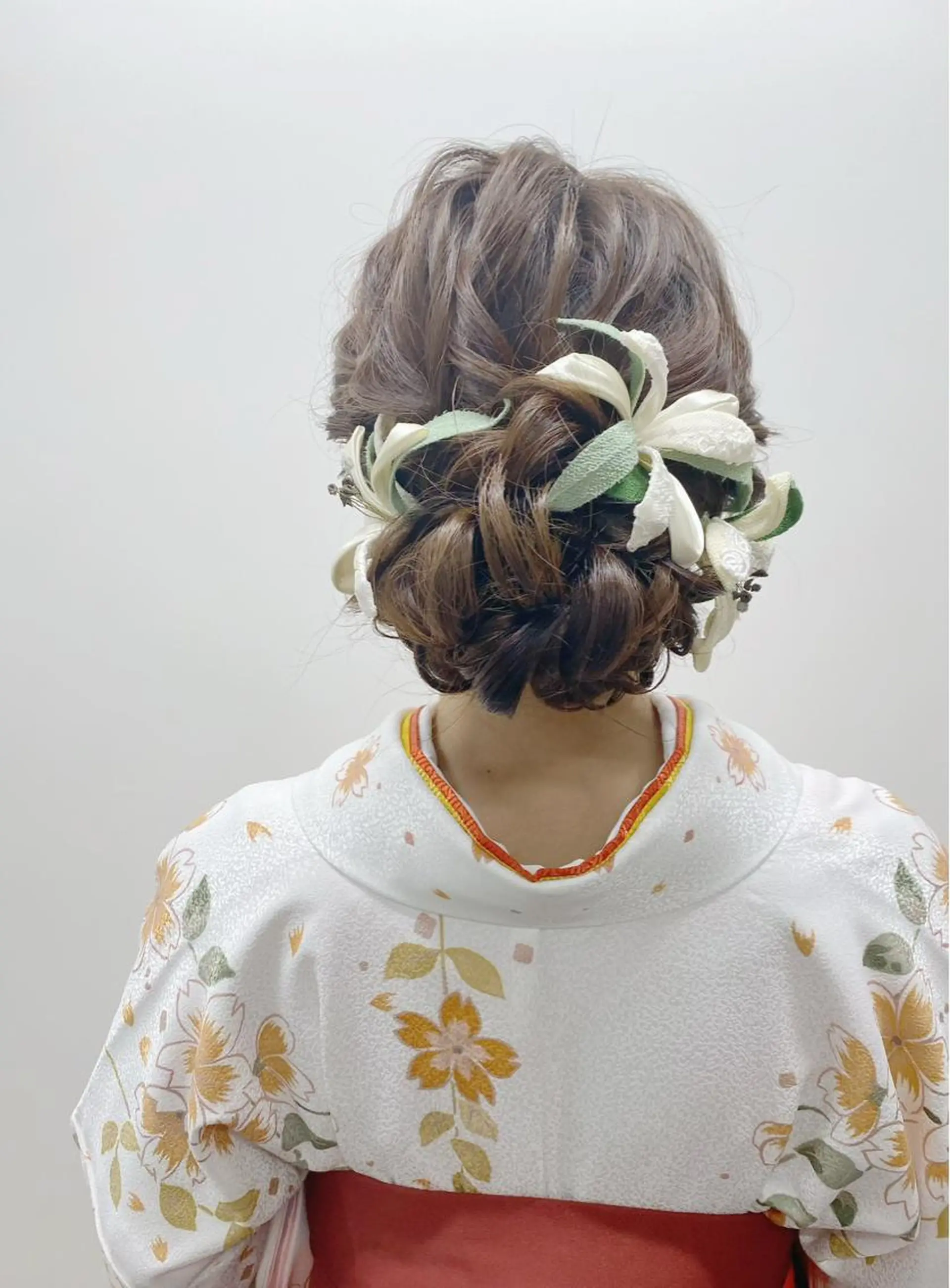 ロング ヘアアレンジ 卒業式のヘアスタイル GRANLUSSO 〜グランルッソ駅前店所属・木口 嘉美のヘアスタイル