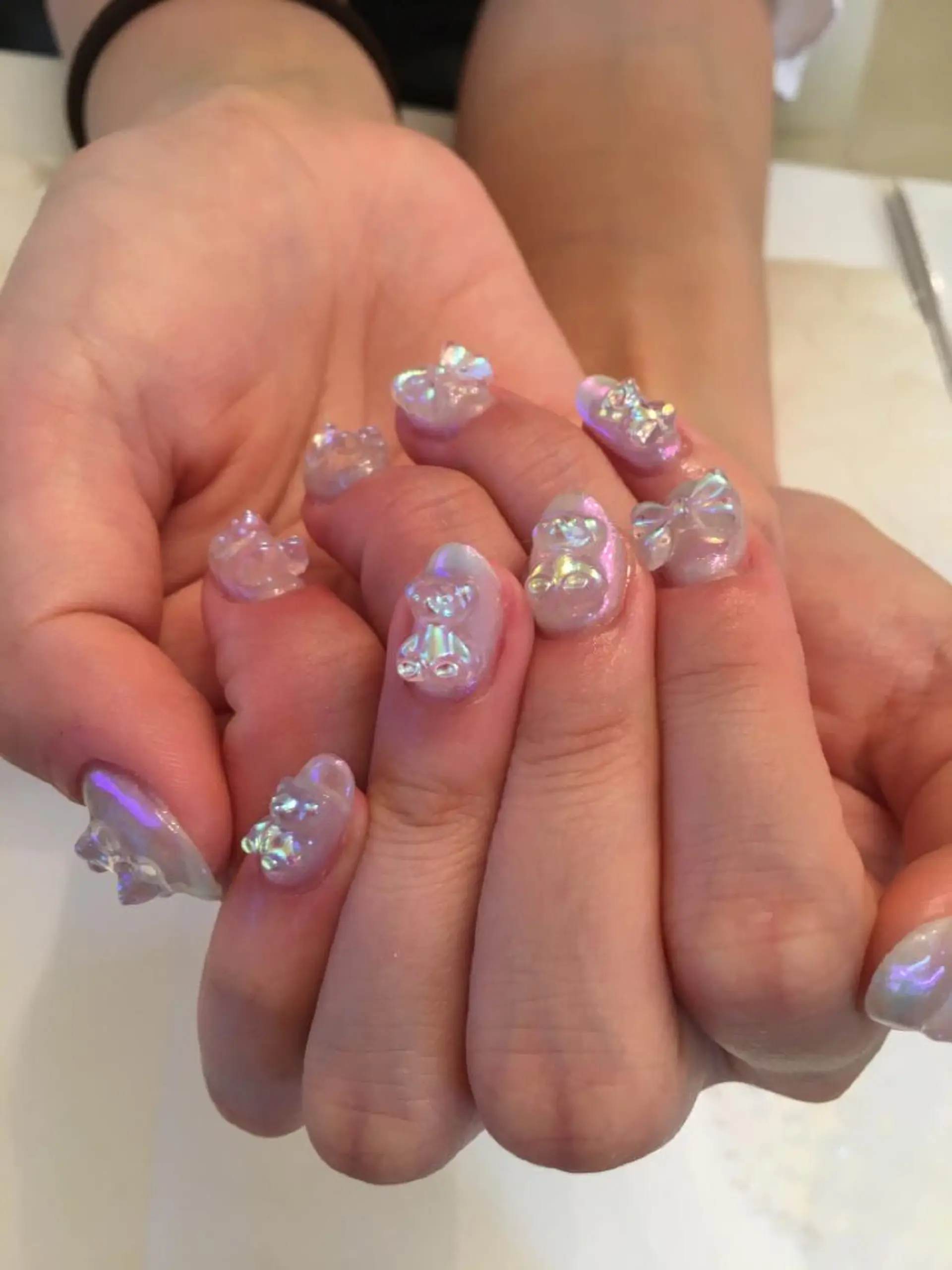 ネイル オーロラネイル キラキラネイル リボン ネイルサロン ショコラのネイルデザイン