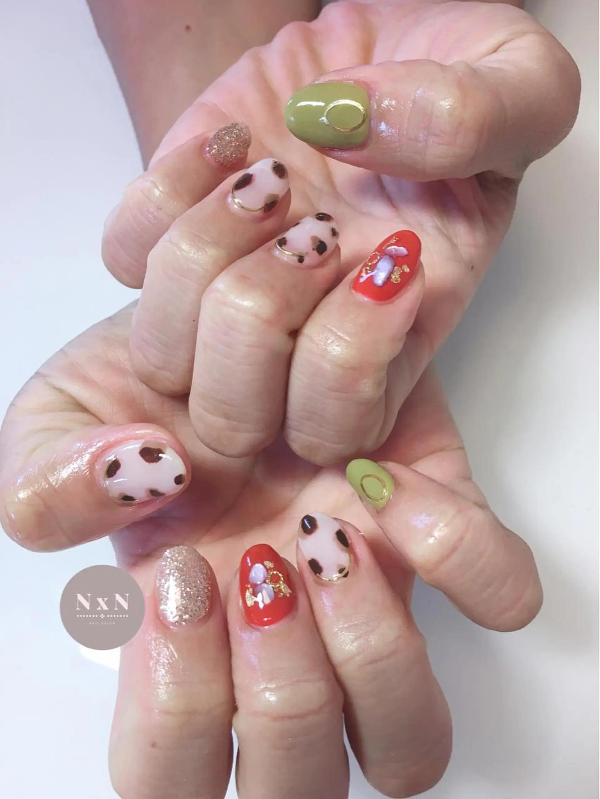ネイル アニマル柄 ジェルネイル オレンジ ピスタチオネイル ぷっくりネイル ハンドネイル nail salon N×Nのネイルデザイン