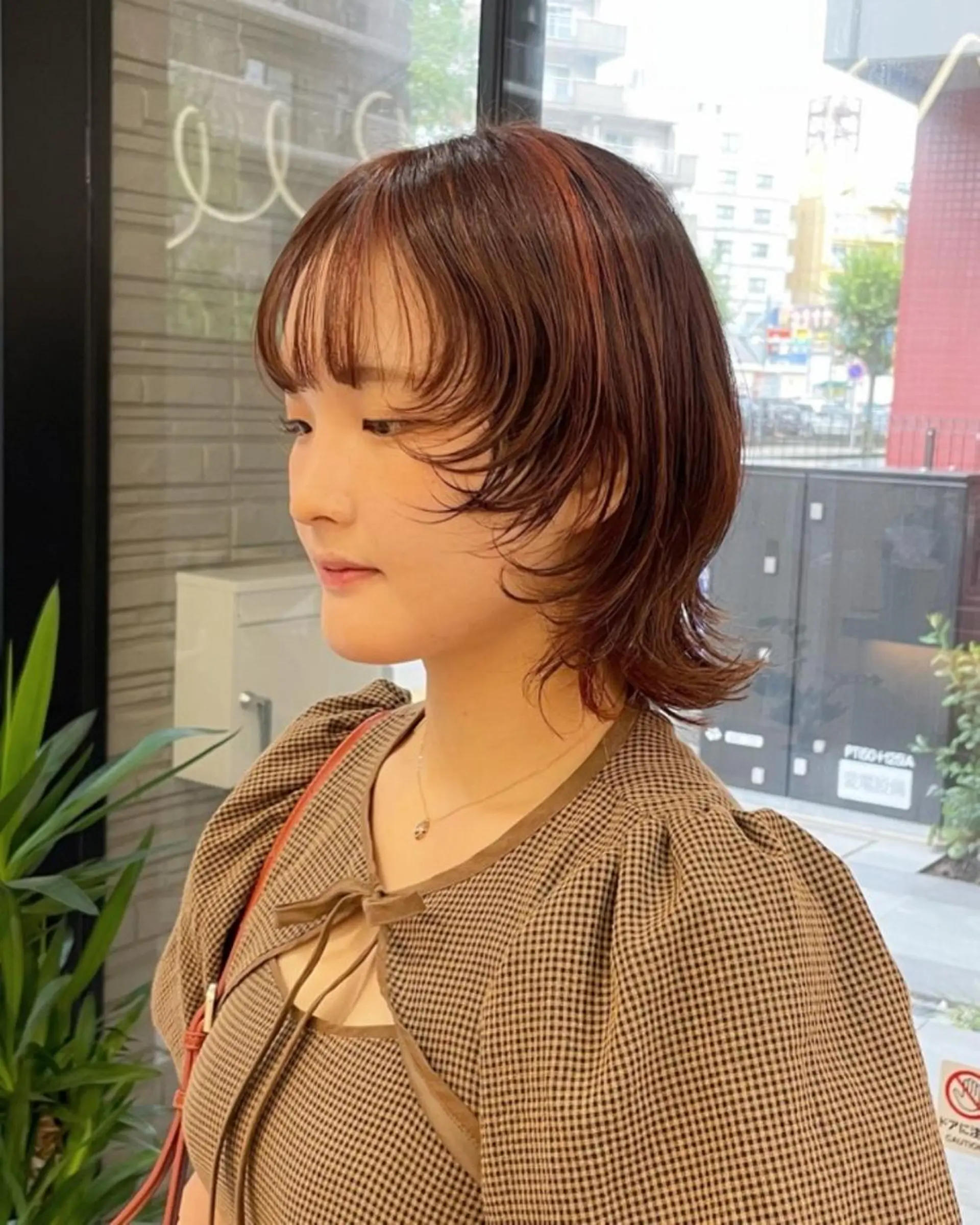 ミディアム カラー デザインカラー オレンジ くせ毛 ウルフカット Saki サキのヘアスタイル