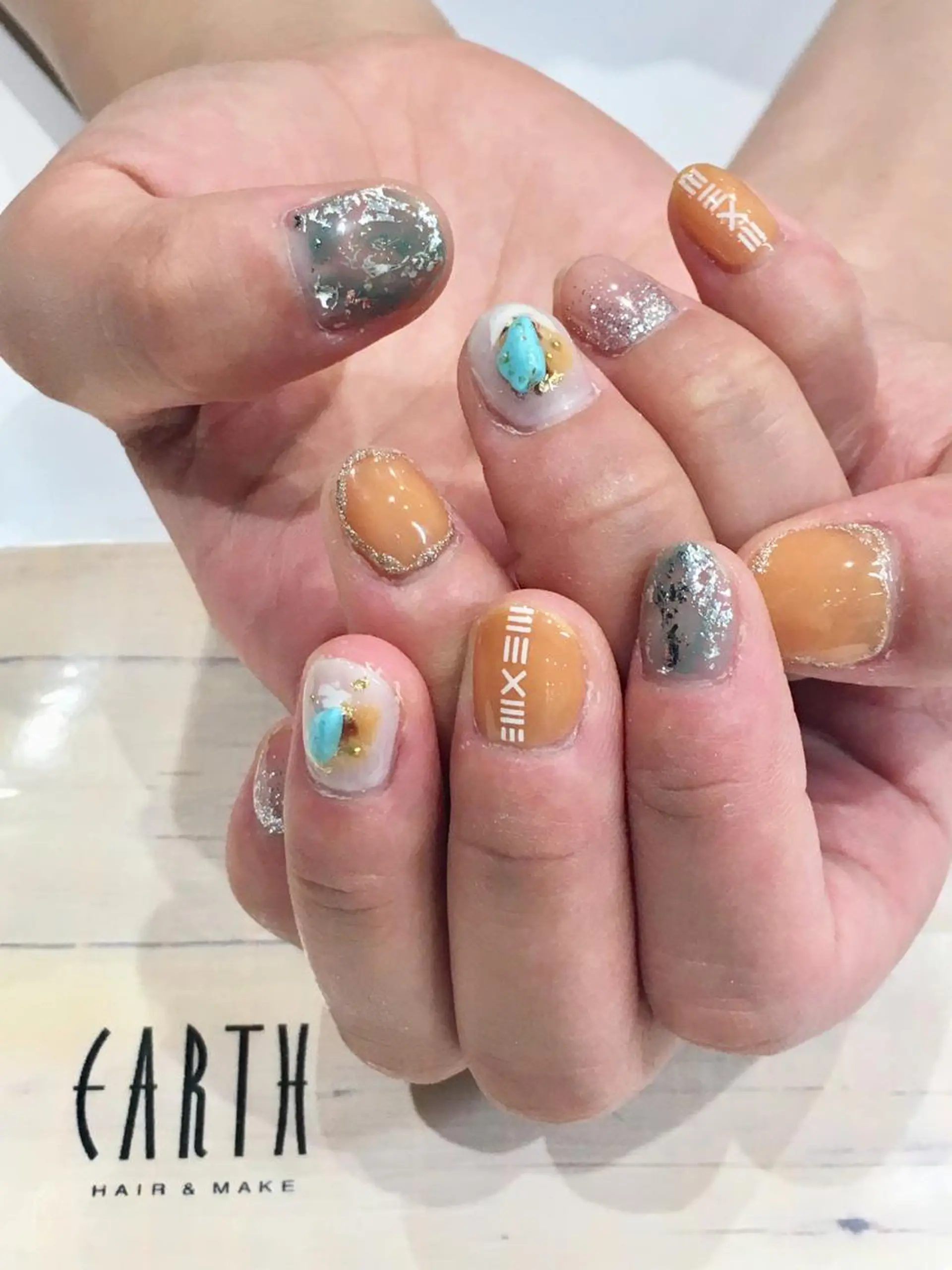 ネイル クリアネイル ニュアンスネイル 黄色 ハンドネイル 佐藤 まりえのネイルデザイン