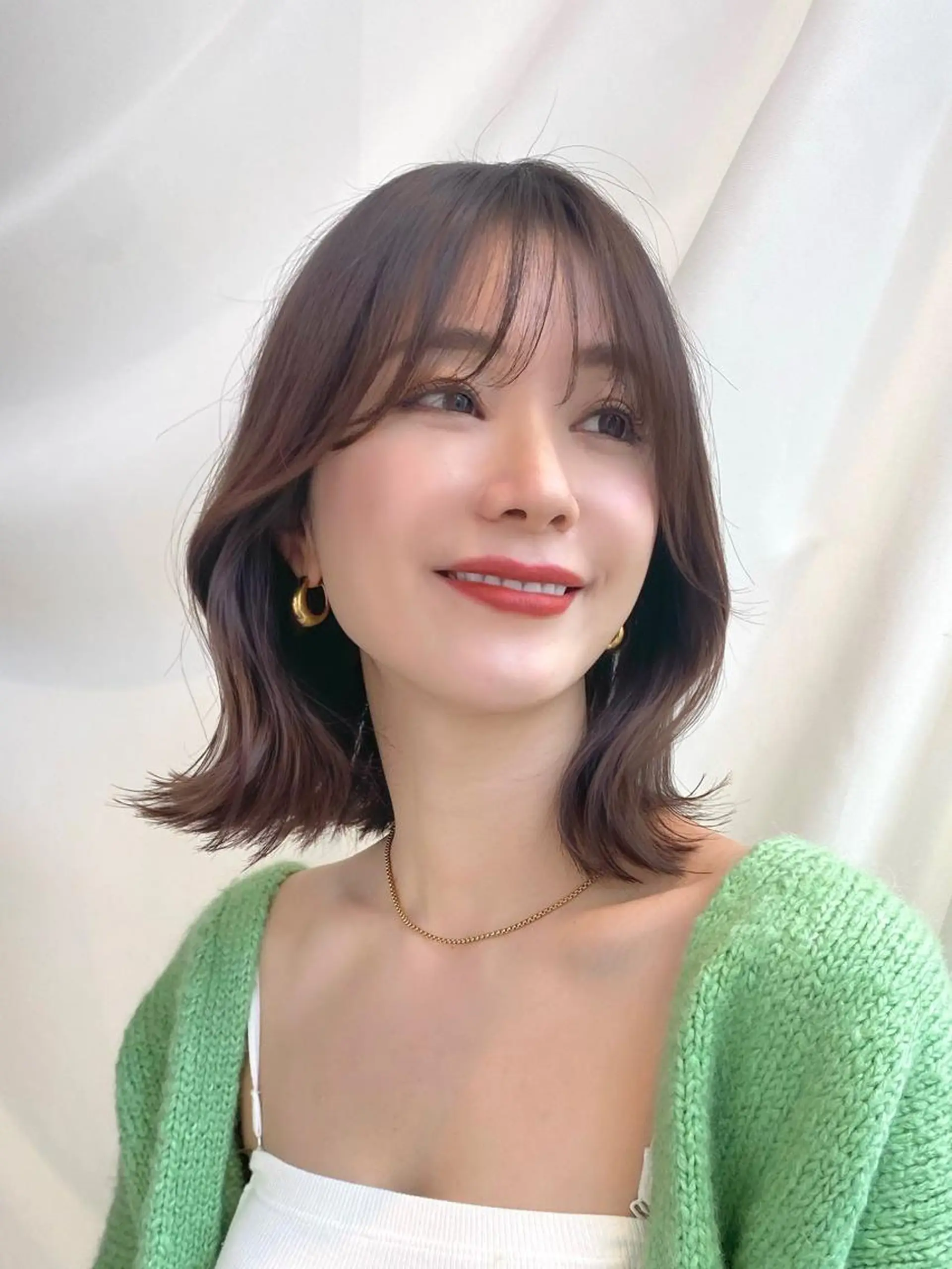 ミディアム カラー パーマ ヘアアレンジ 切りっぱなしボブ アディクシーカラー ブリーチ 透明感カラー イルミナカラー カット ヘアカラー トリートメント ヘアセット 小野寺瑞希 /最小顔カットのヘアスタイル