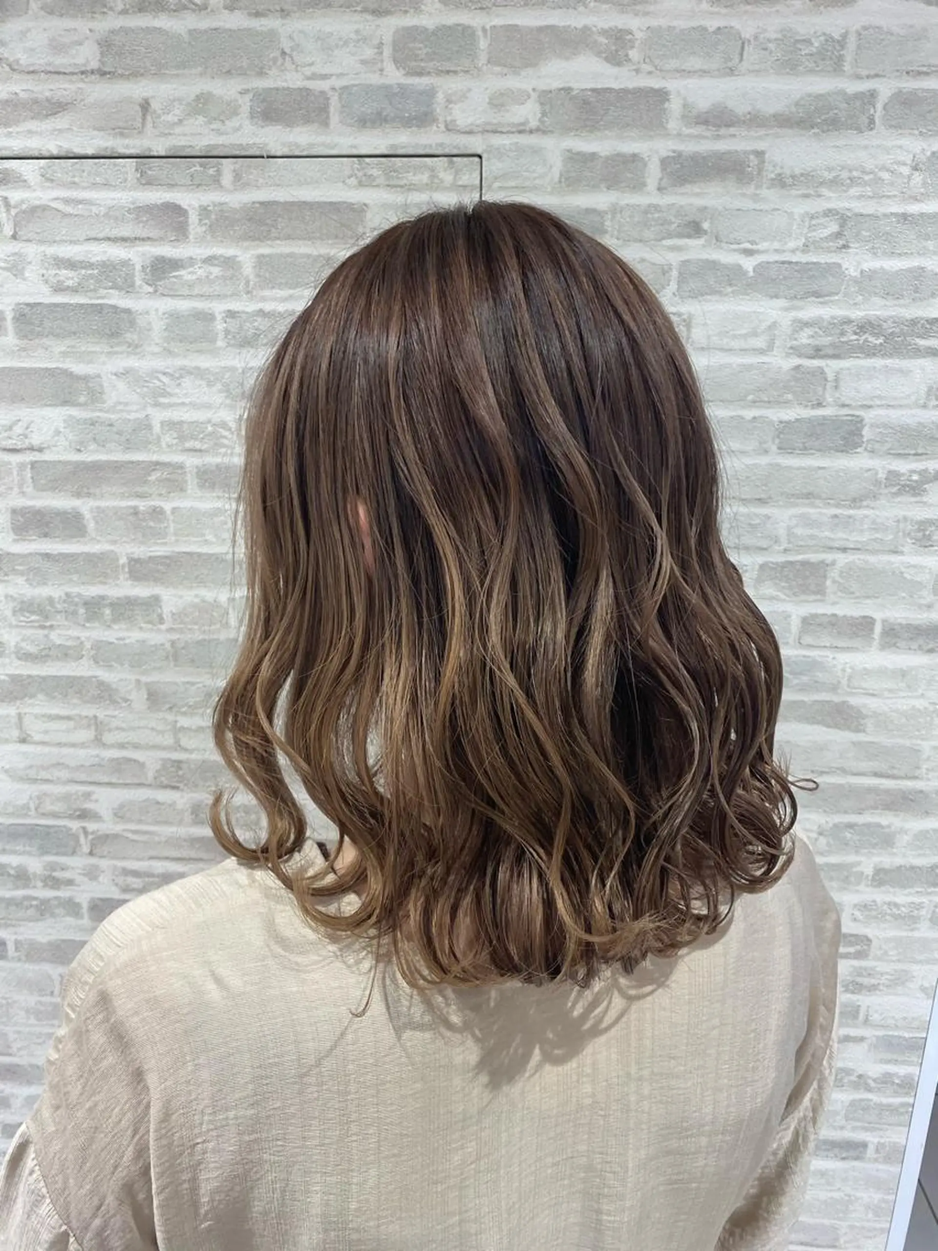 ミディアム 小金丸 里沙のヘアスタイル