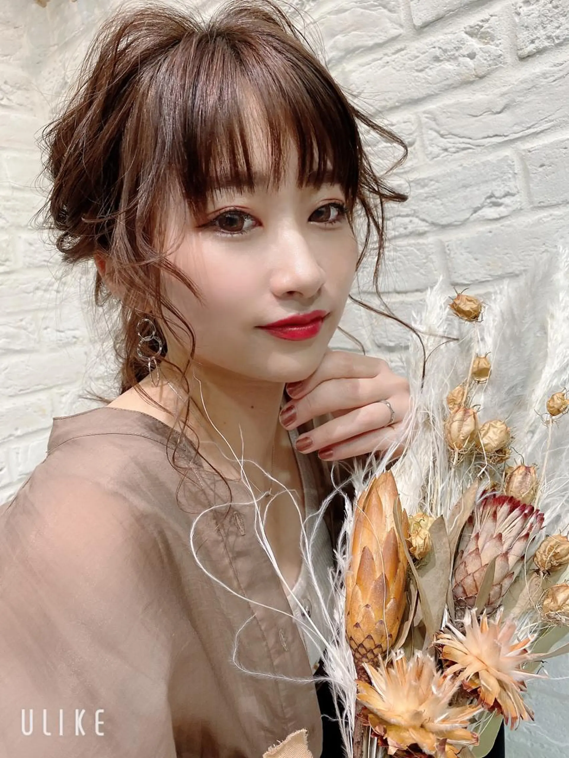 ヘアアレンジ お団子ヘア Seasonal〜（シーズナル）所属・伊藤 早人のヘアスタイル