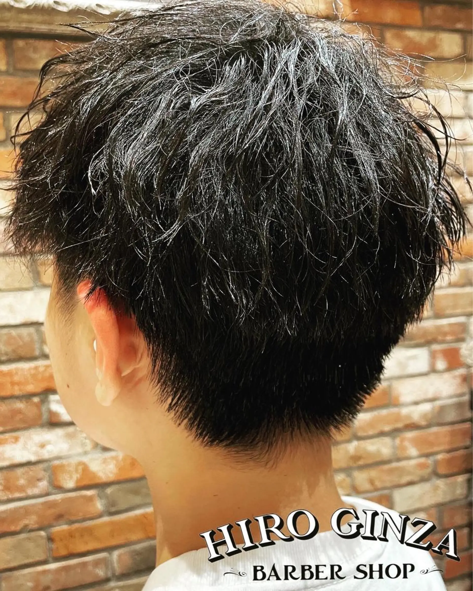 ミディアム パーマ ヘアアレンジ メンズ ミディアムパーマ メンズパーマ ツイストスパイラルパーマ スパイラルパーマ ヒロ銀座BARBERSHOP丸の内店所属・ヒロ銀座　石川 昂のヘアスタイル
