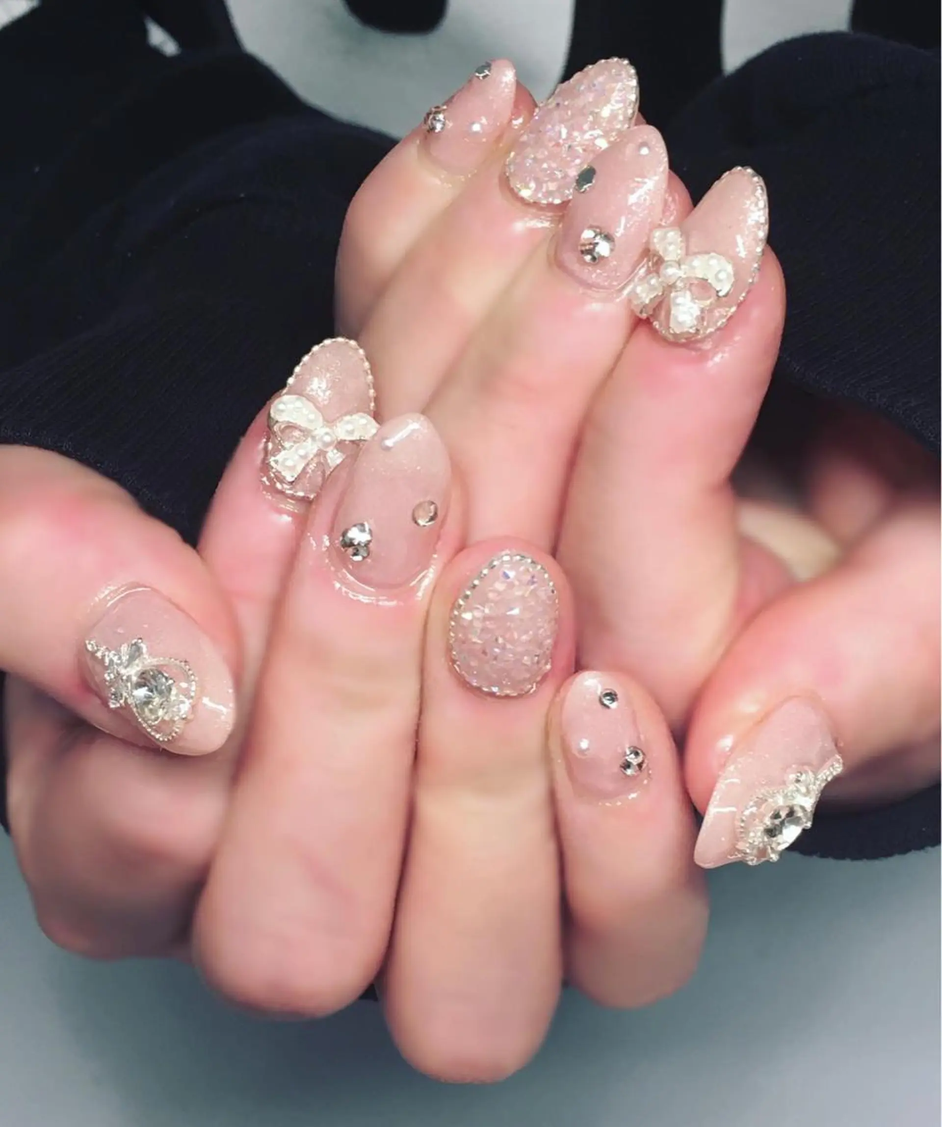 ネイル ジェルネイル キラキラネイル ピンク リボン 春ネイル Nyanco Nailのネイルデザイン