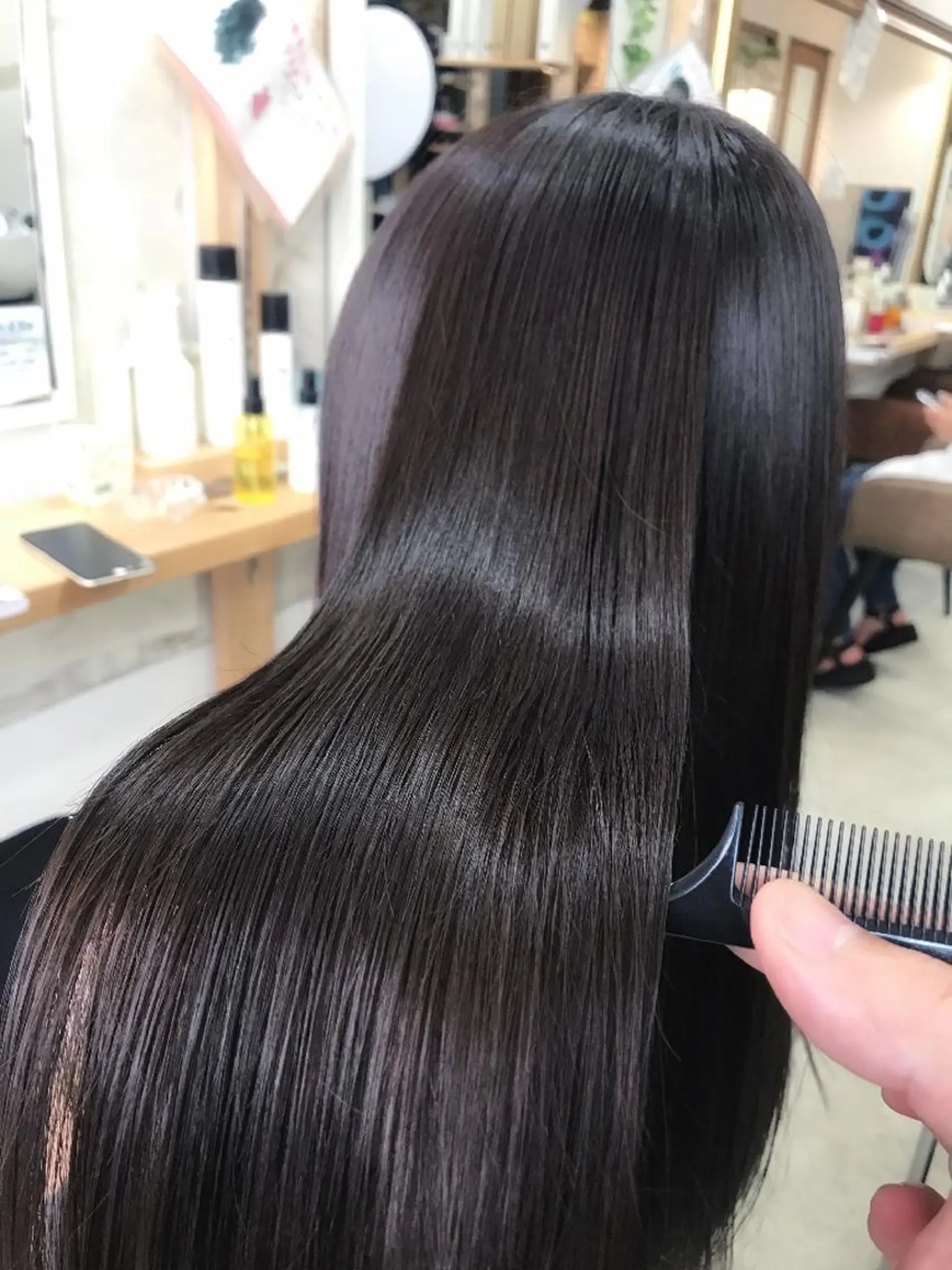 ロング カラー トリートメント AnFye une qatllのヘアスタイル