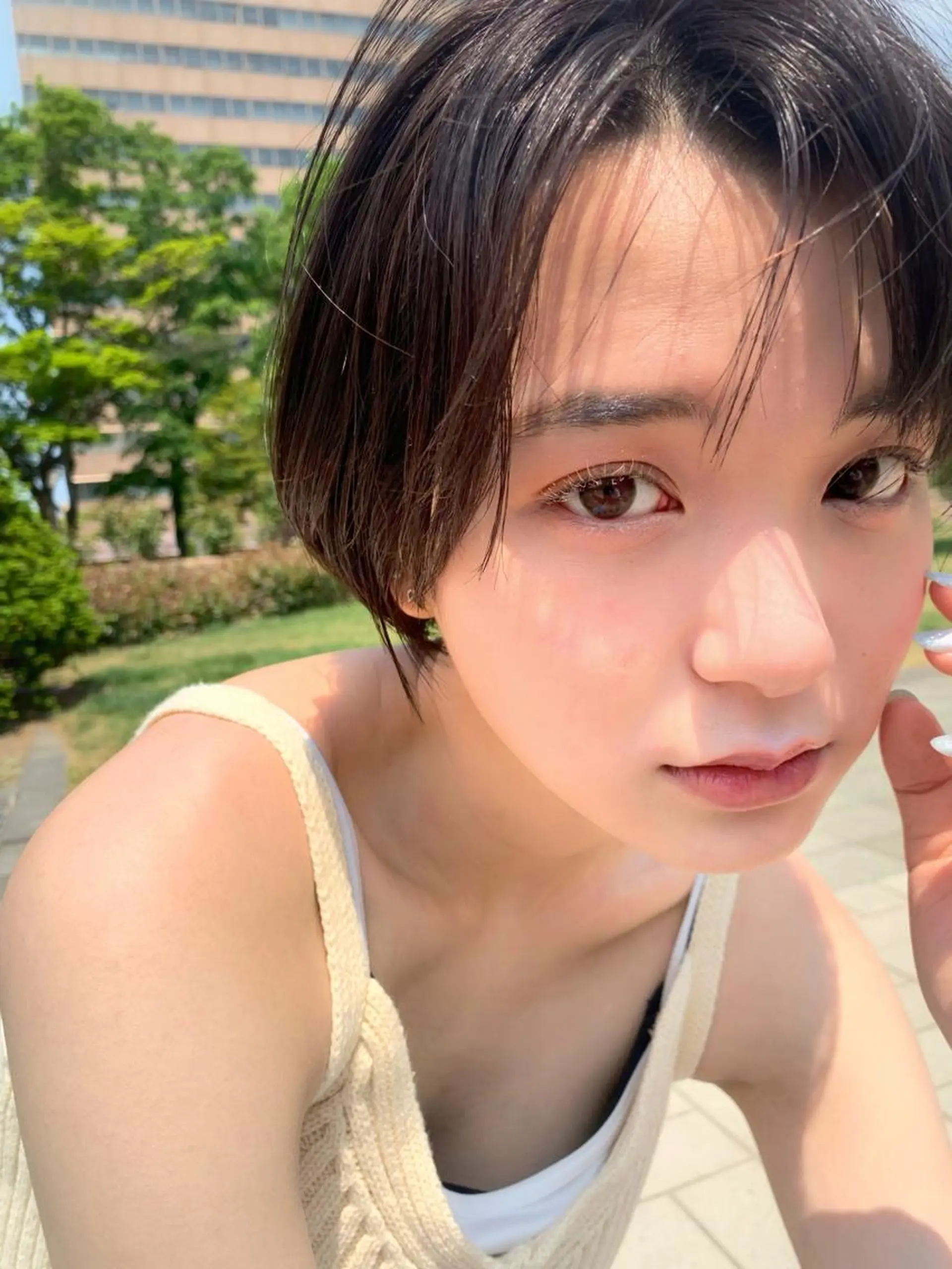 ショート カラー パーマ ヘアアレンジ ネイル マツエク・マツパ アイブロウ 前髪パーマ/割れ癖 /レイヤー/駅近のヘアスタイル