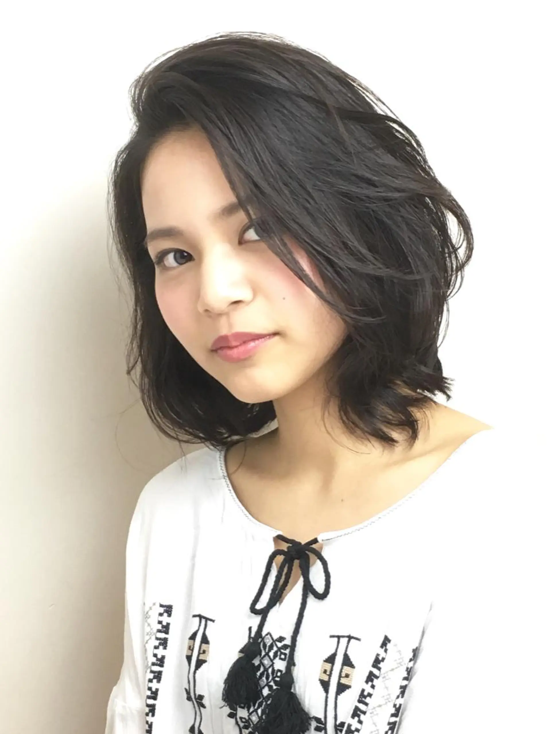 ミディアム パーマ かきあげバング TONI&GUY福岡天神所属・牧野 美波のヘアスタイル