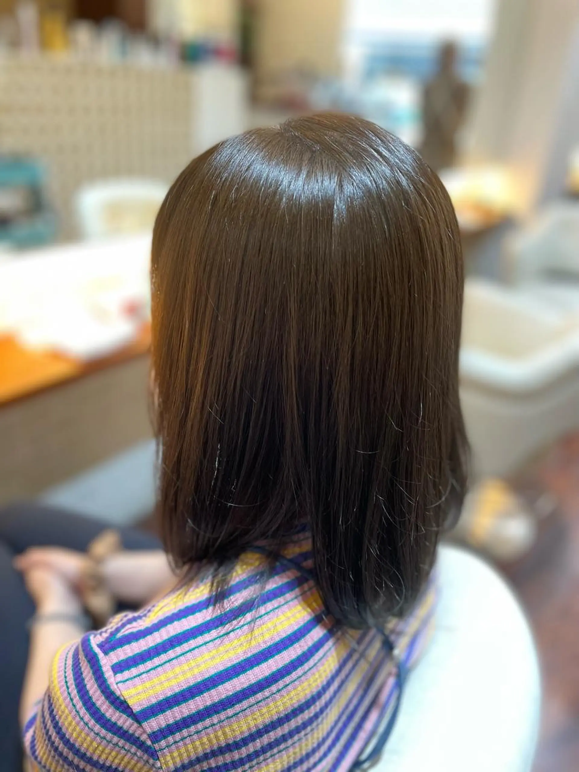 ミディアム パーマ ヘアカラー CoCooN Hiromiのヘアスタイル