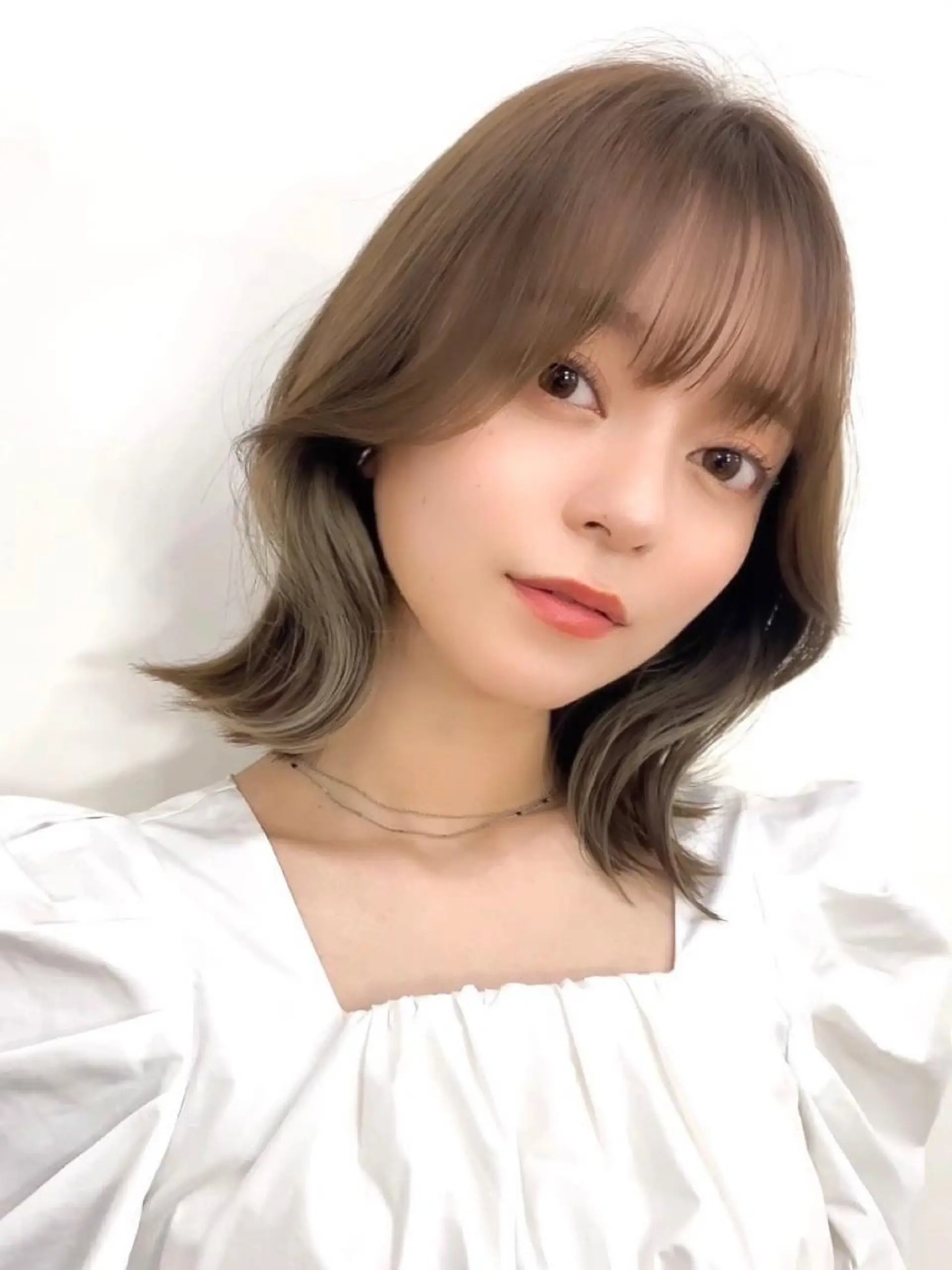 ミディアム カラー パーマ ヘアアレンジ 切りっぱなしボブ アディクシーカラー ブリーチ 透明感カラー イルミナカラー カット ヘアカラー トリートメント ヘアセット 小野寺瑞希 /最小顔カットのヘアスタイル