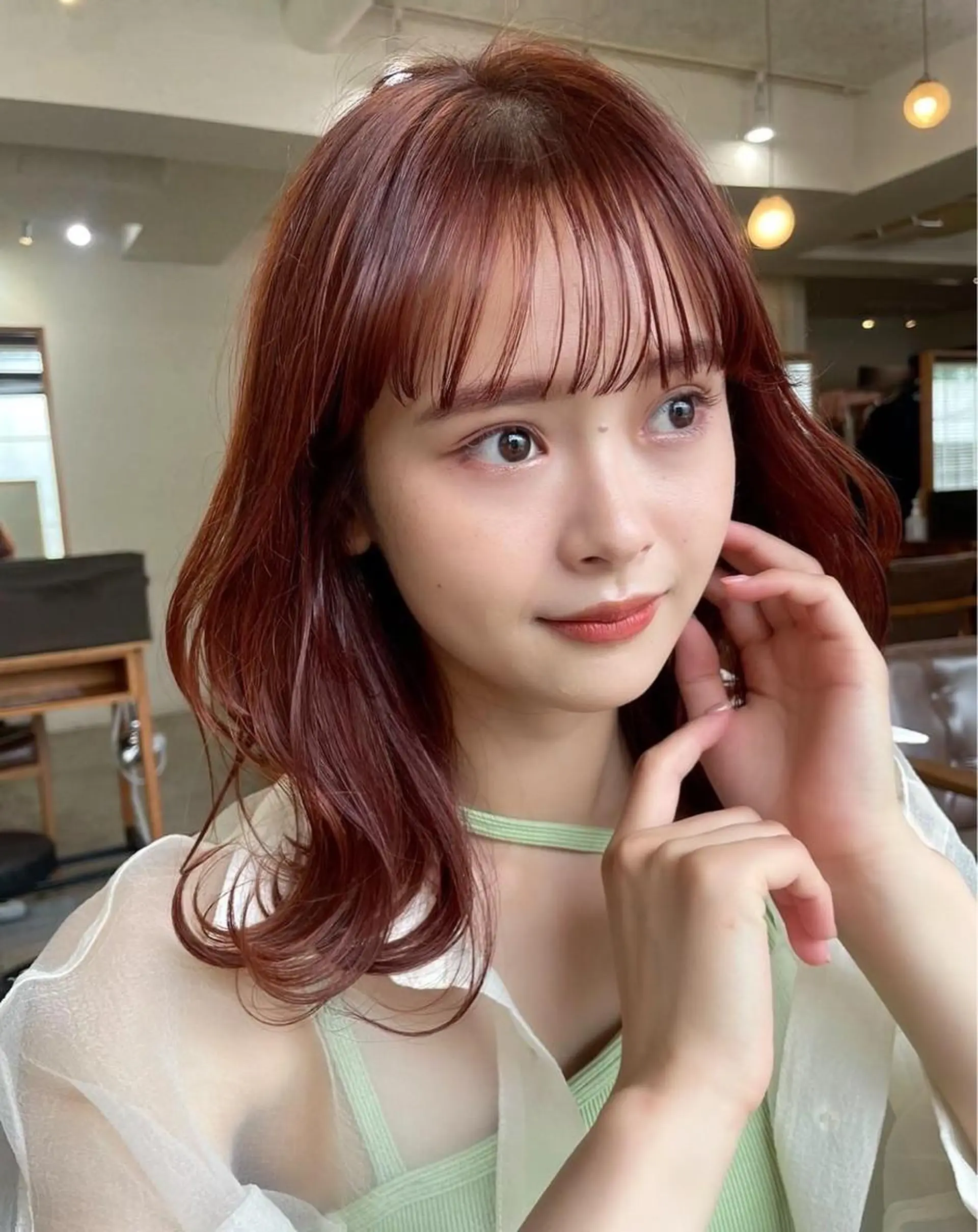 セミロング カラー オレンジピンク fumi🪞血色感 アップ艶カラーのヘアスタイル