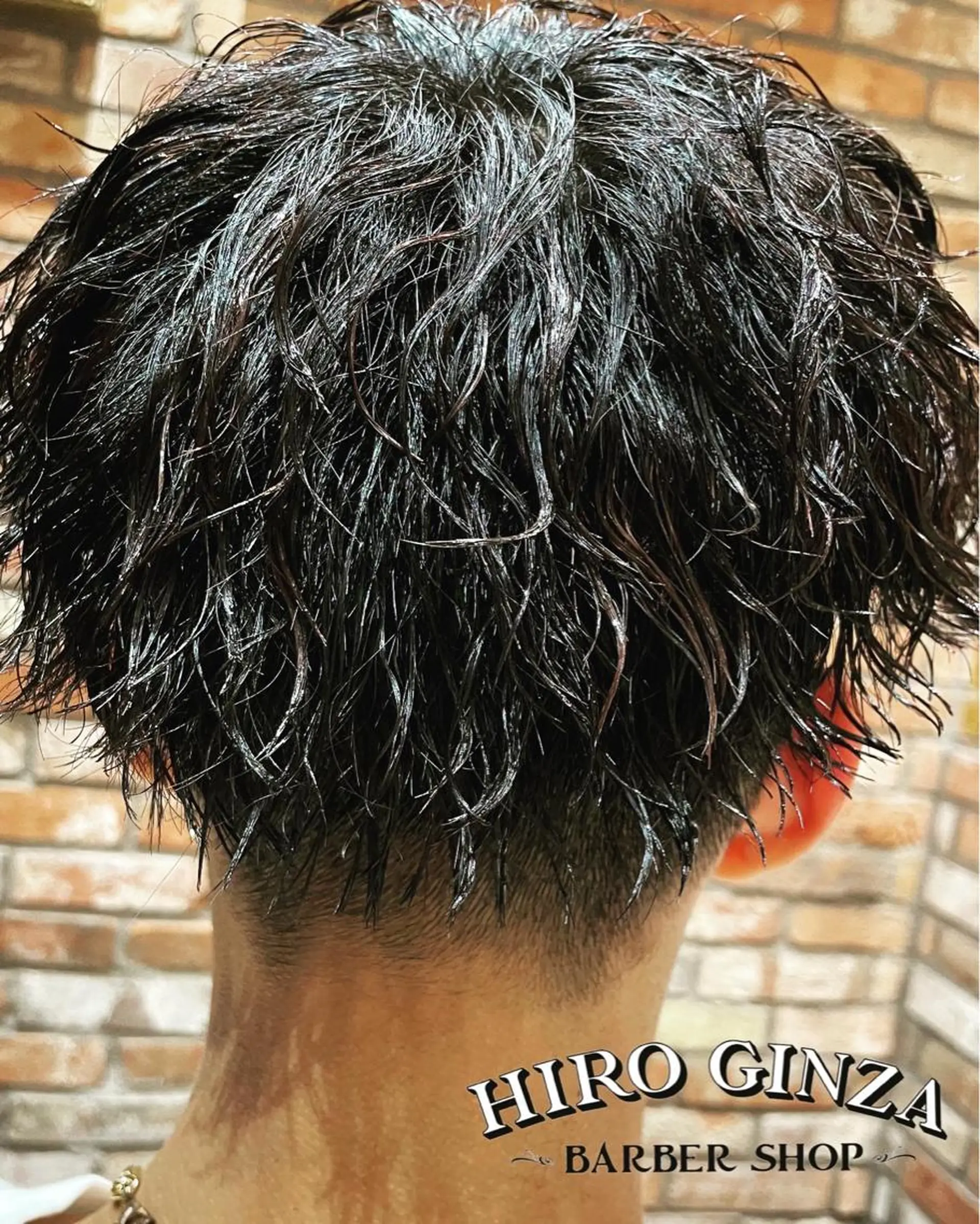 ミディアム パーマ ヘアアレンジ メンズ ミディアムパーマ メンズパーマ ツイストスパイラルパーマ スパイラルパーマ ヒロ銀座BARBERSHOP丸の内店所属・ヒロ銀座　石川 昂のヘアスタイル